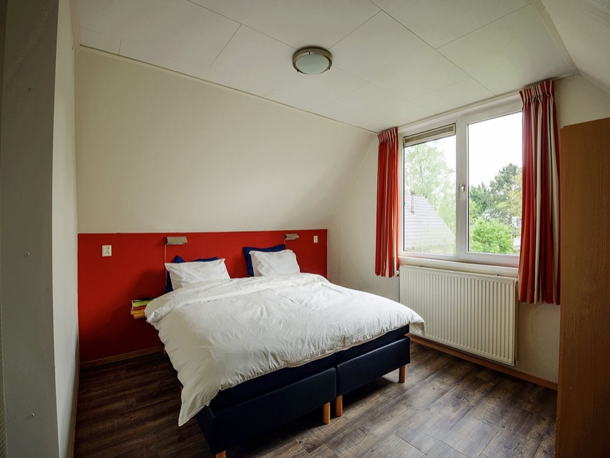 Een slaapkamer van Holiday home 6 persons in Scherpenzeel