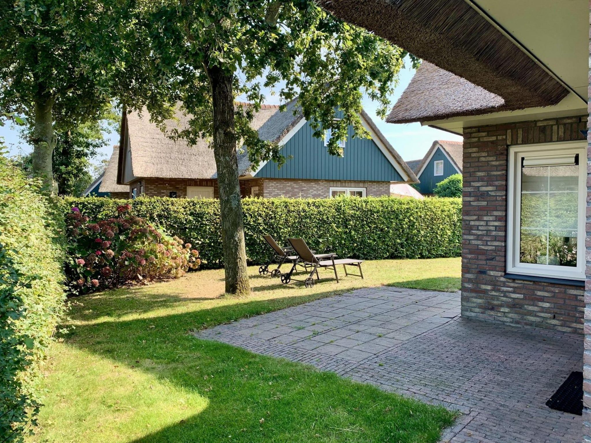 De tuin van Anzelhoef 7 in Sint Maartenszee