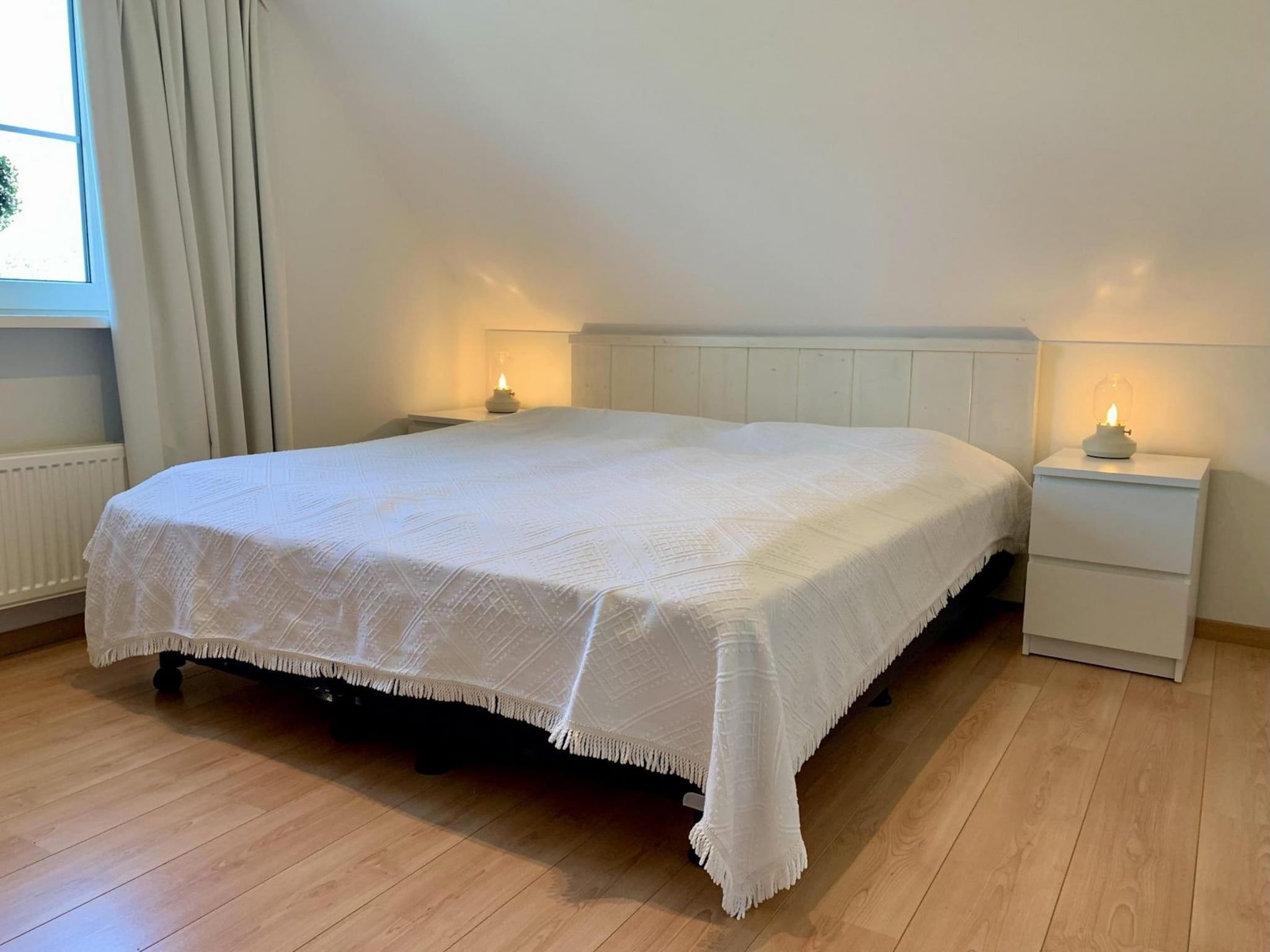 Een slaapkamer van Anzelhoef 7 in Sint Maartenszee