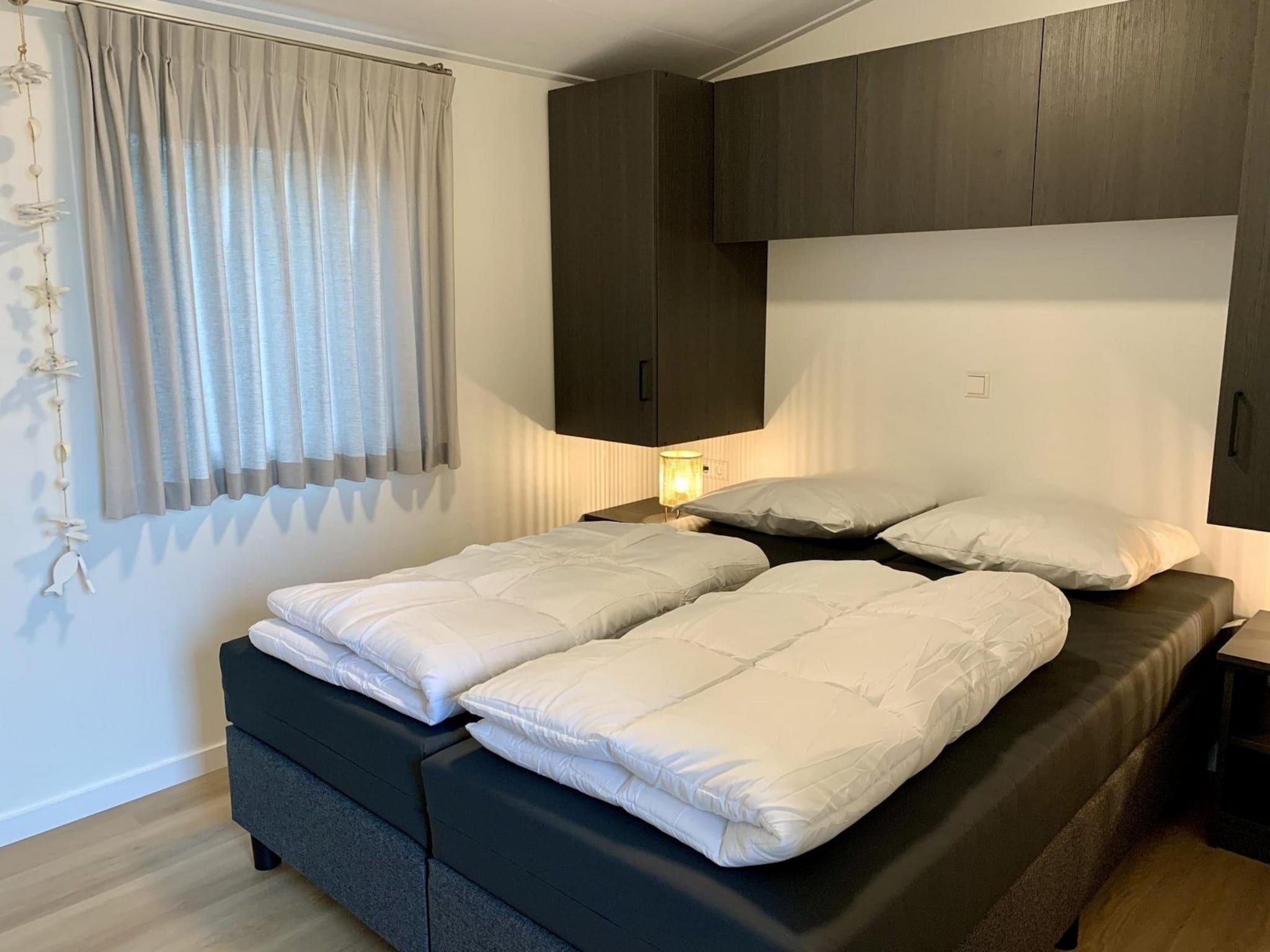 Een slaapkamer van Campanula 224 in Sint Maartenszee