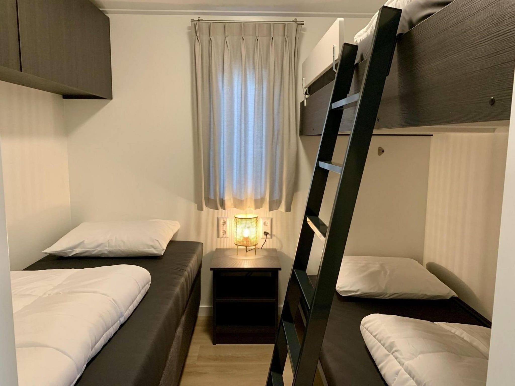 Een slaapkamer van Campanula 224 in Sint Maartenszee