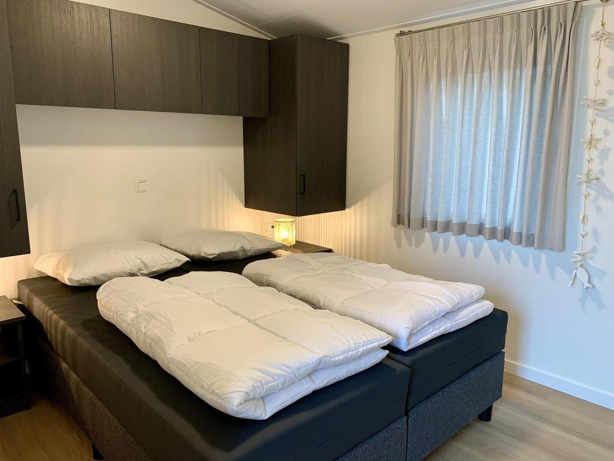 Een slaapkamer van Campanula 224 in Sint Maartenszee