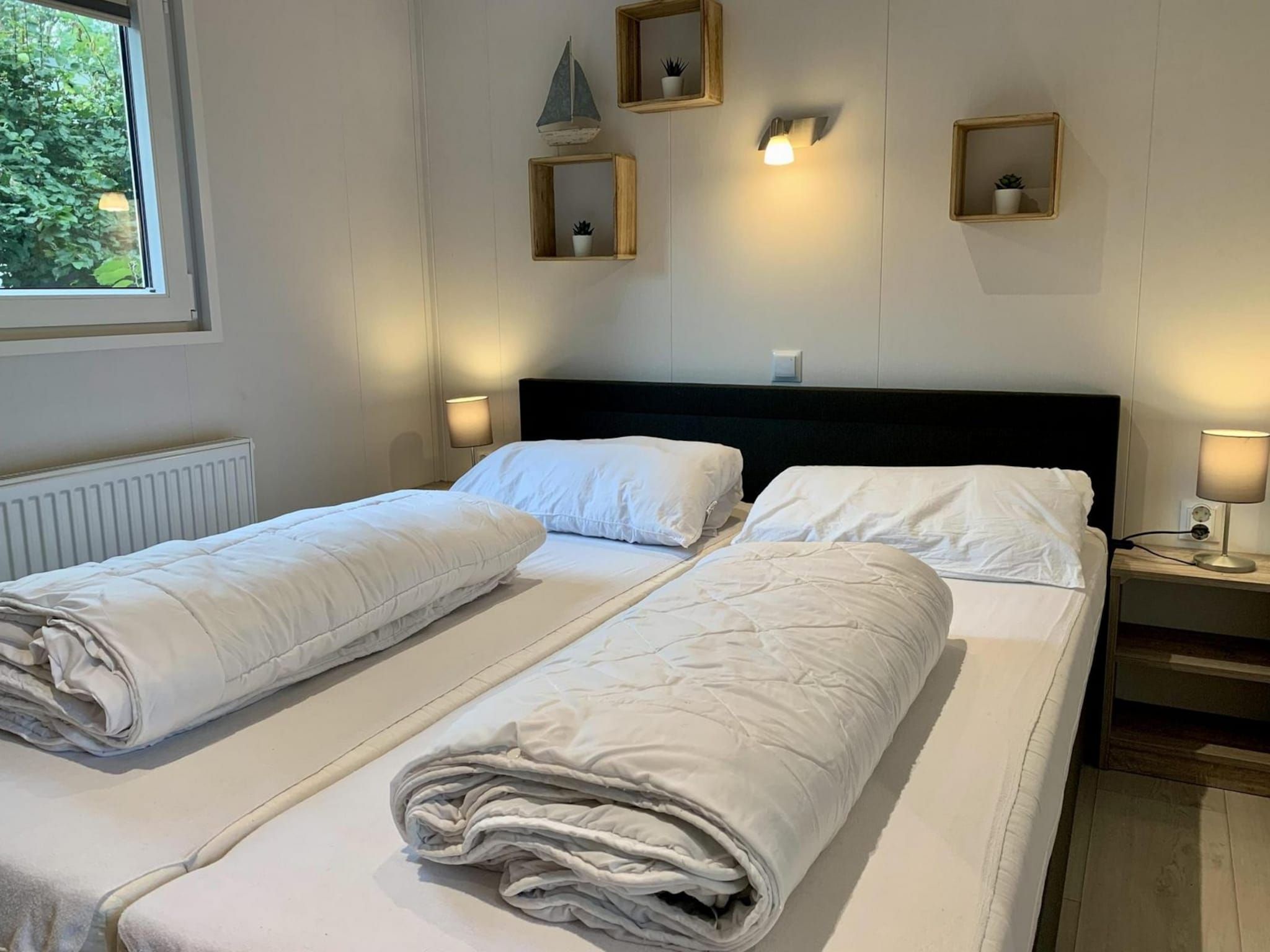 Een slaapkamer van Campanula 191 in Sint Maartenszee