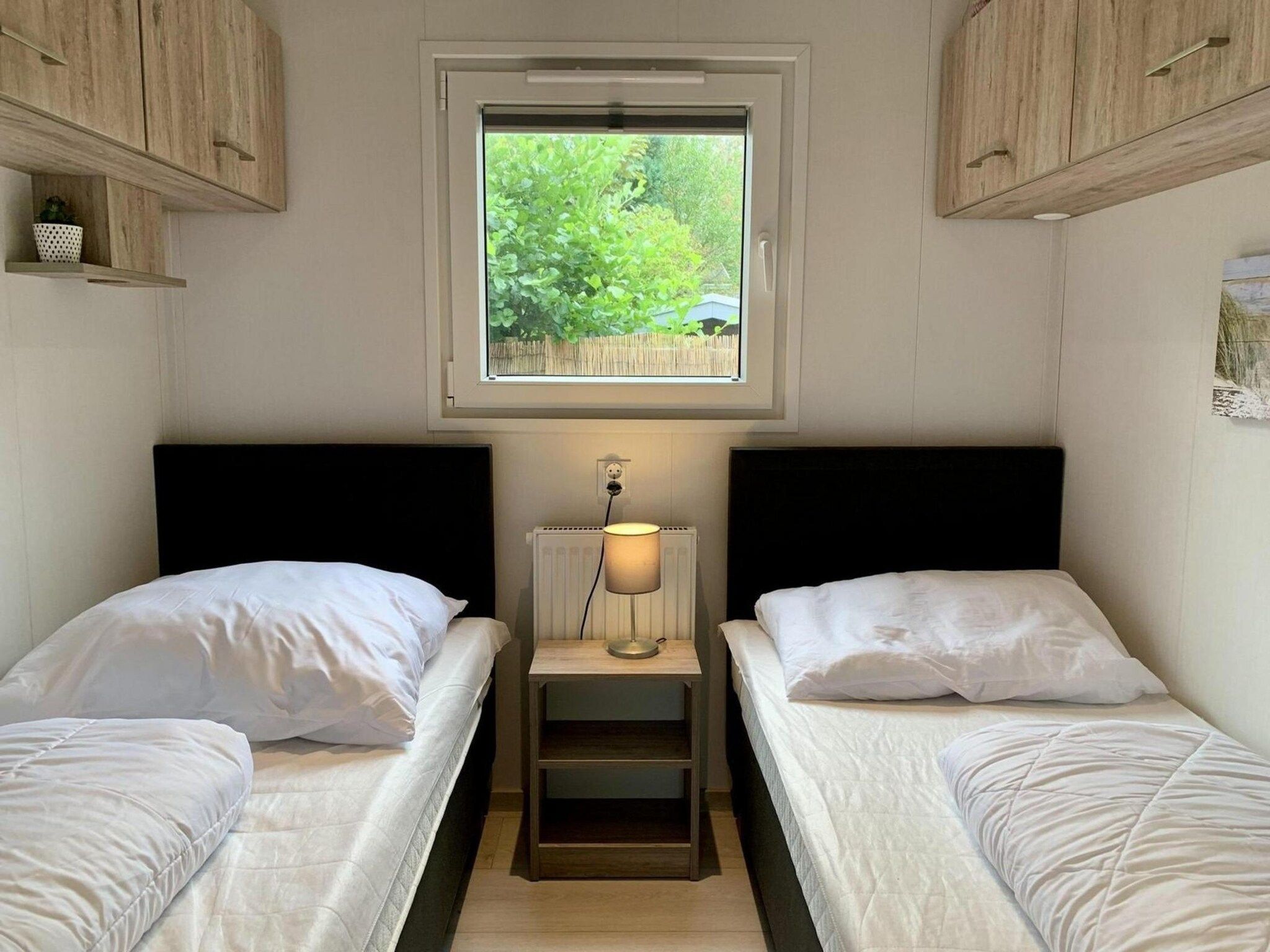 Een slaapkamer van Campanula 191 in Sint Maartenszee