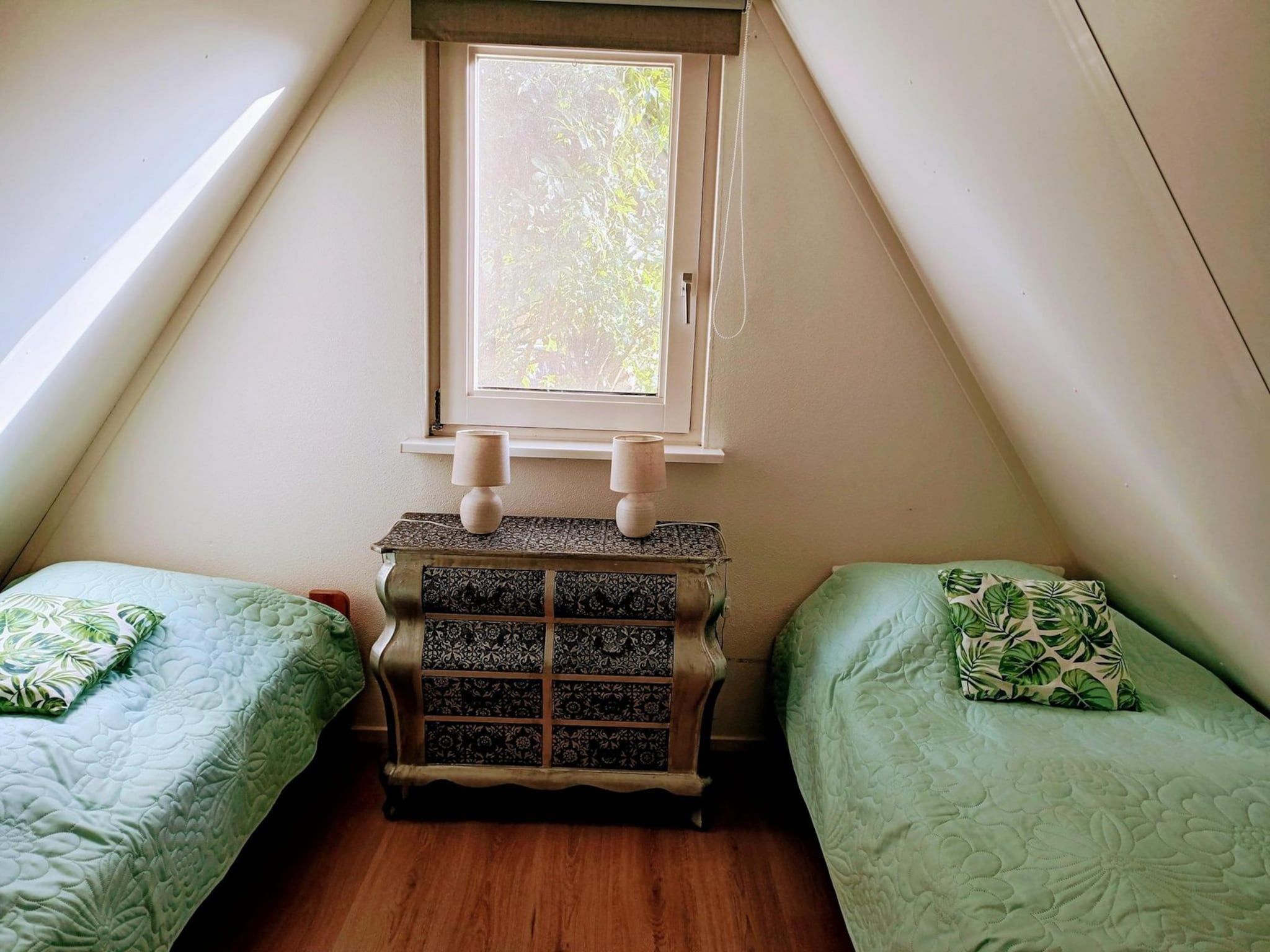 Een slaapkamer van Vogelvrij 3 in Sint Maartenszee