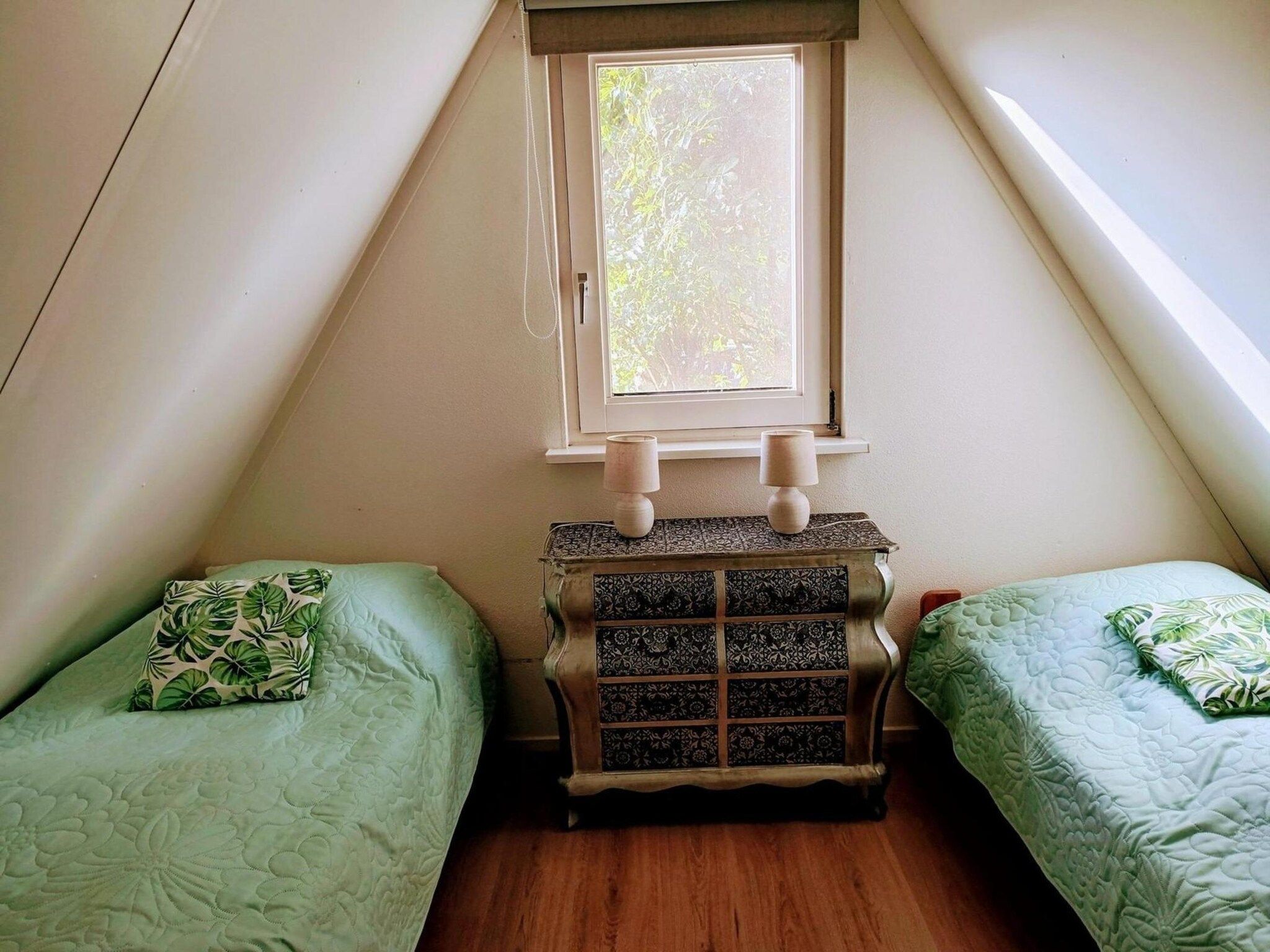 Een slaapkamer van Vogelvrij 3 in Sint Maartenszee
