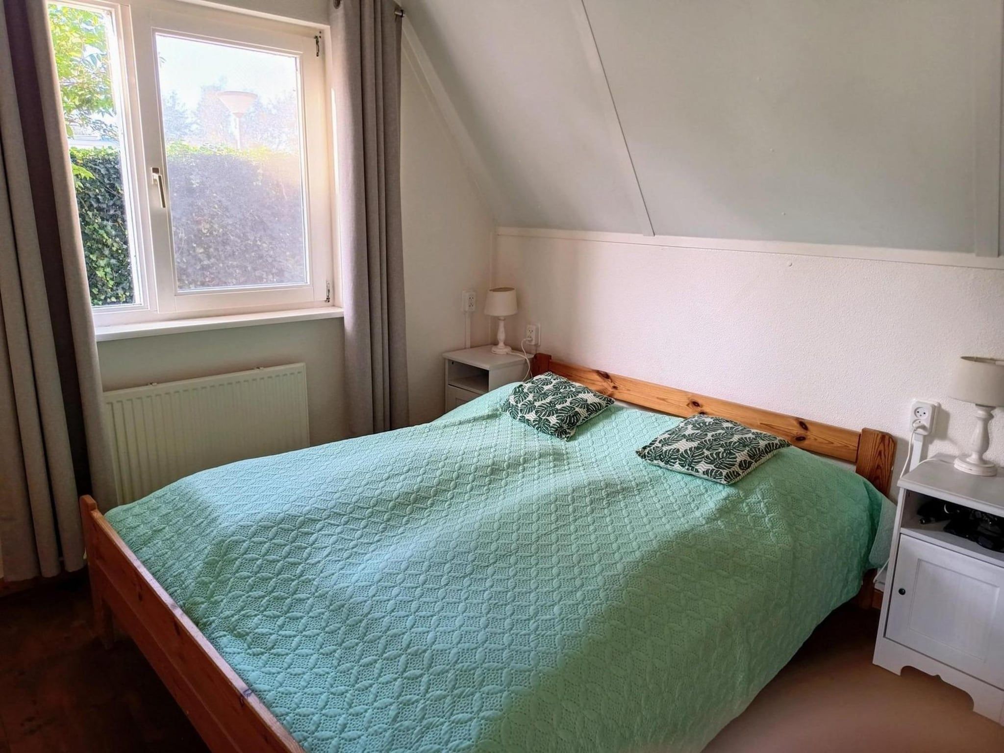 Een slaapkamer van Vogelvrij 3 in Sint Maartenszee