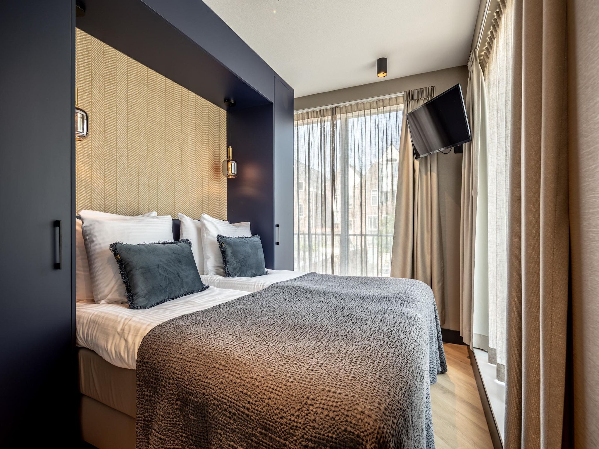 Een slaapkamer van Delft 5A in Delft
