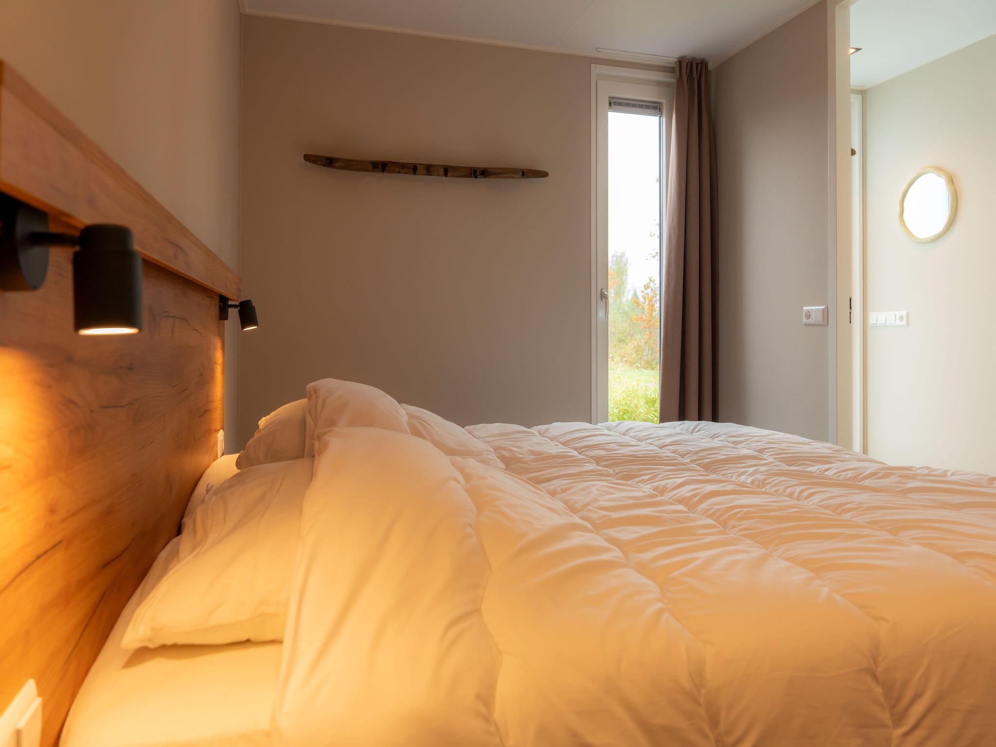 Een slaapkamer van Oan't Wetter in Sint Nicolaasga