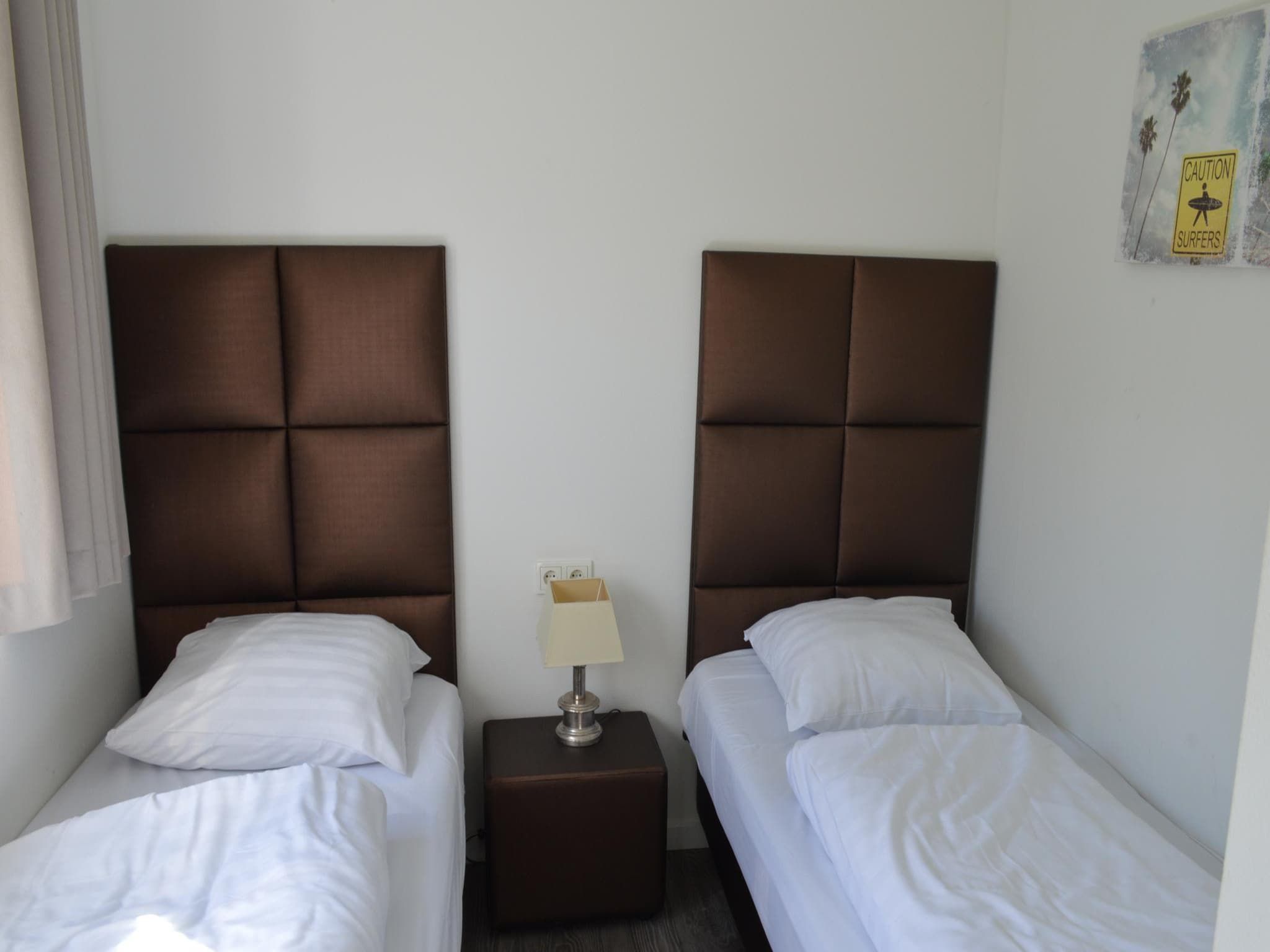 Een slaapkamer van Biebosch - Sunshower in Bemelen