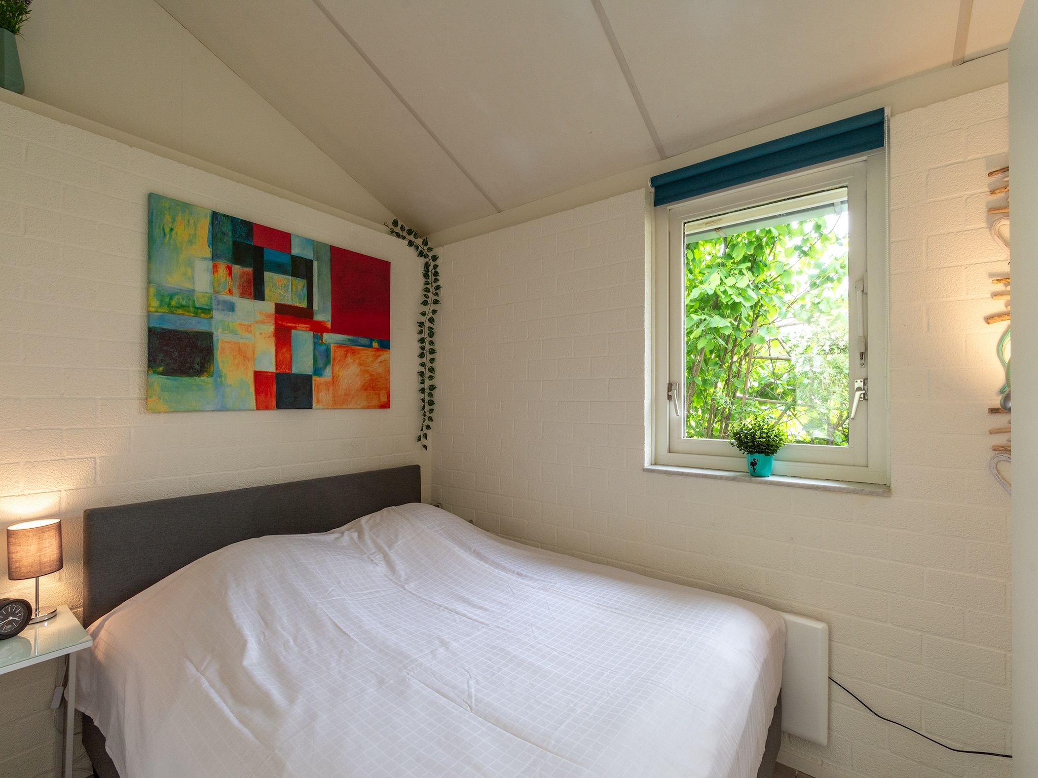Een slaapkamer van Watersnip 9 in Petten
