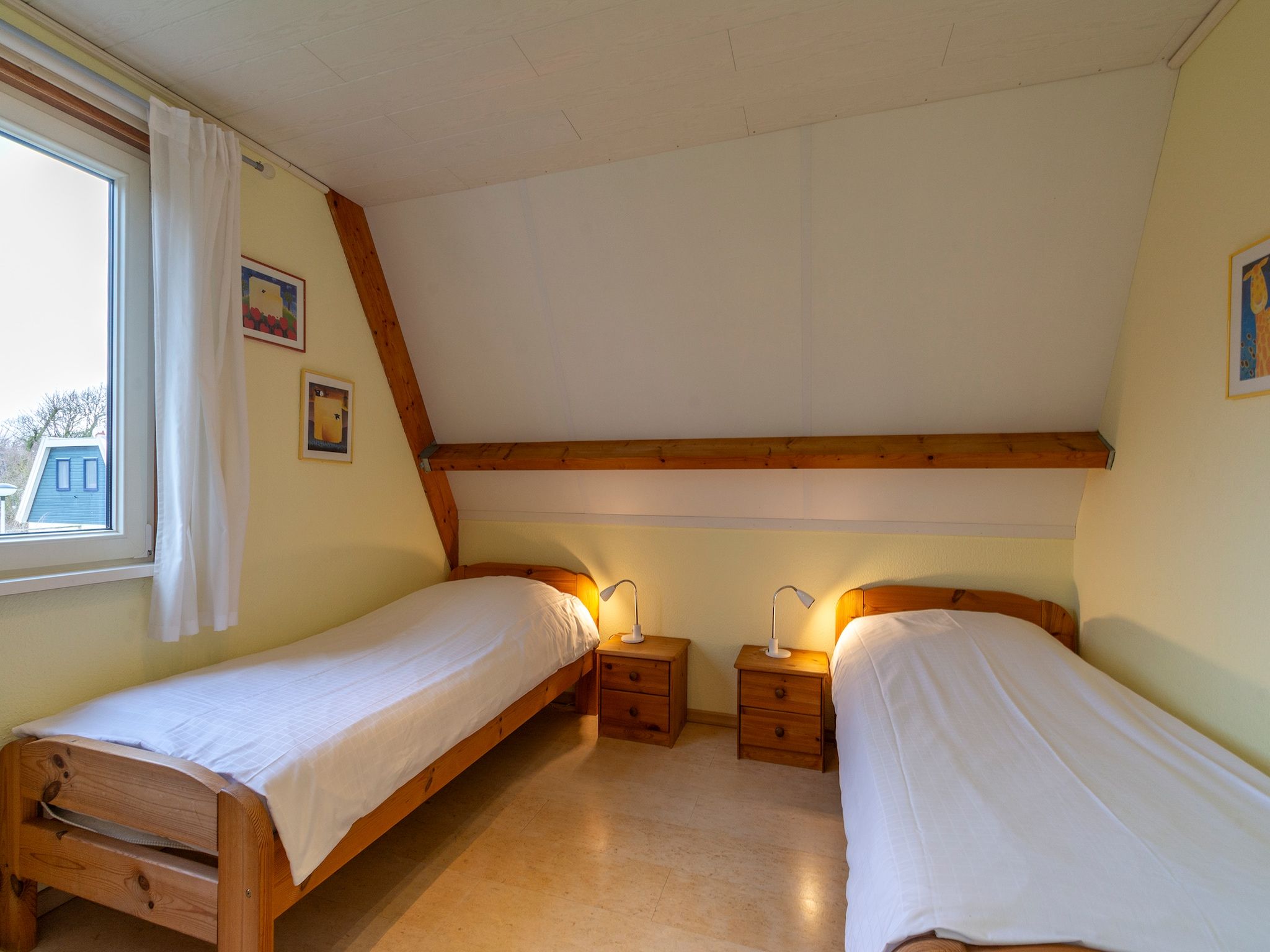 Een slaapkamer van Garnekuul 15 in Callantsoog