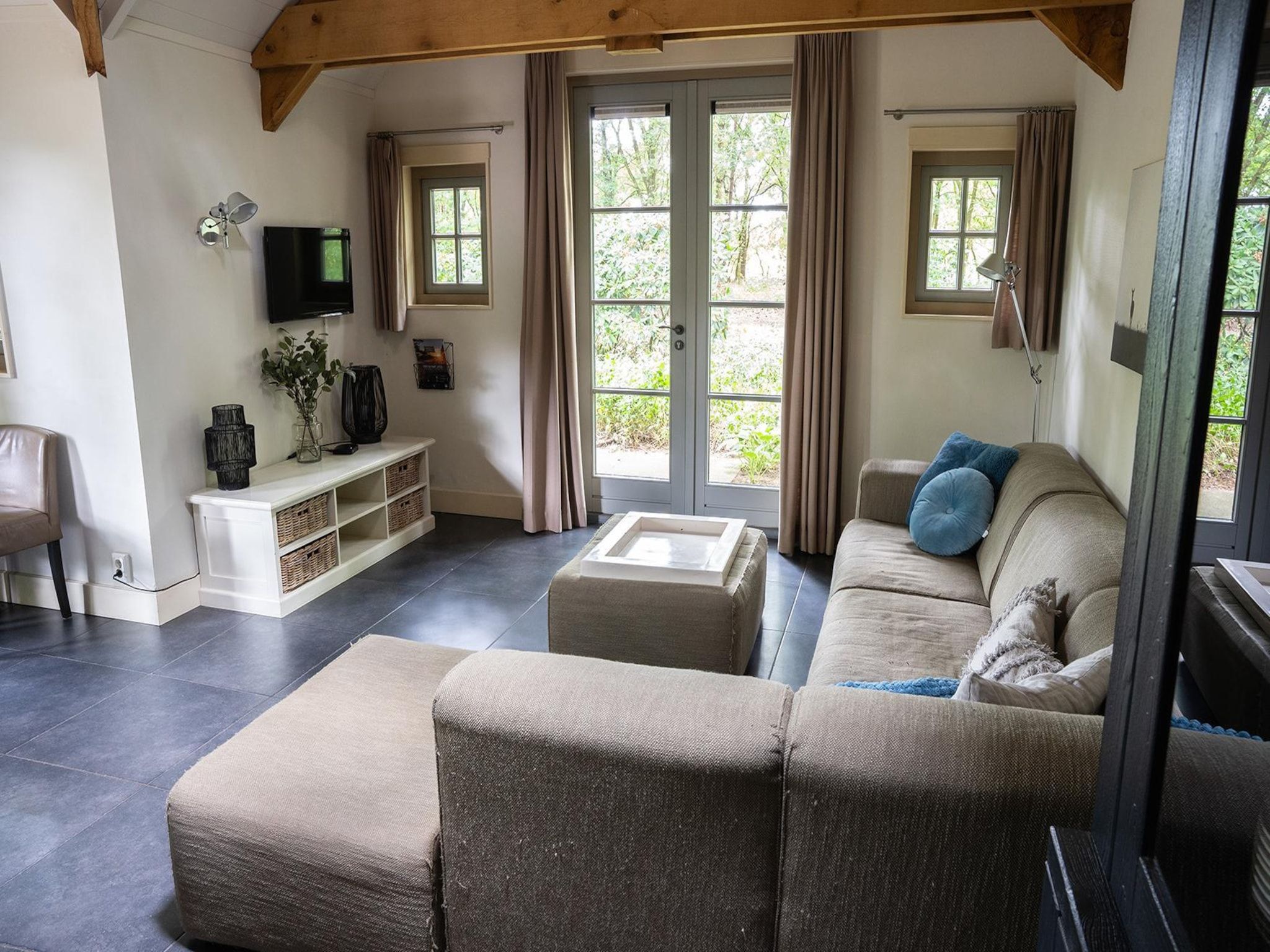 De woonkamer van Vlindervallei Villa 8p in Ermelo