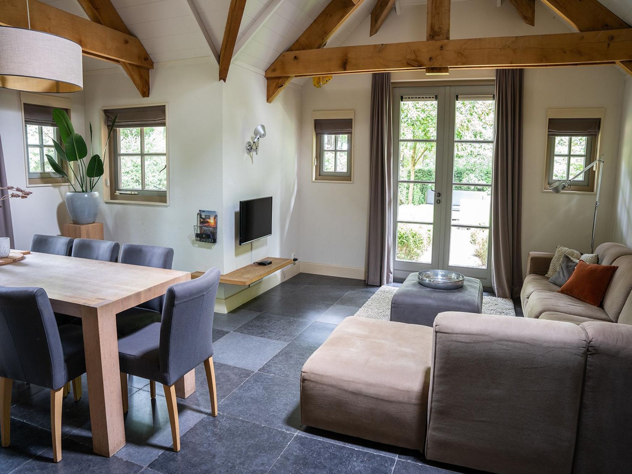 De woonkamer van Vlindervallei Villa 8p in Ermelo