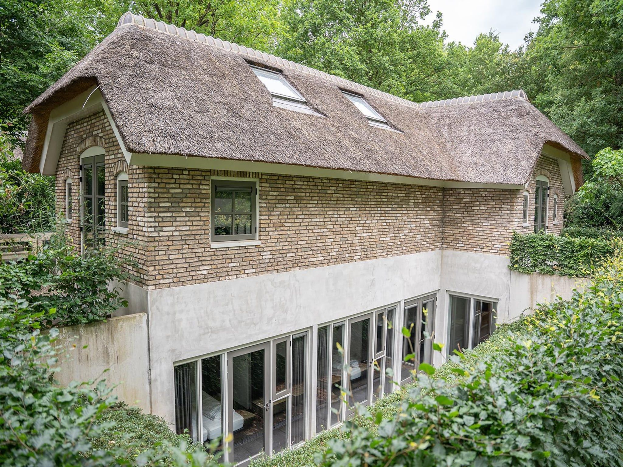De buitenkant van Vlindervallei Boshuis 16p in Ermelo