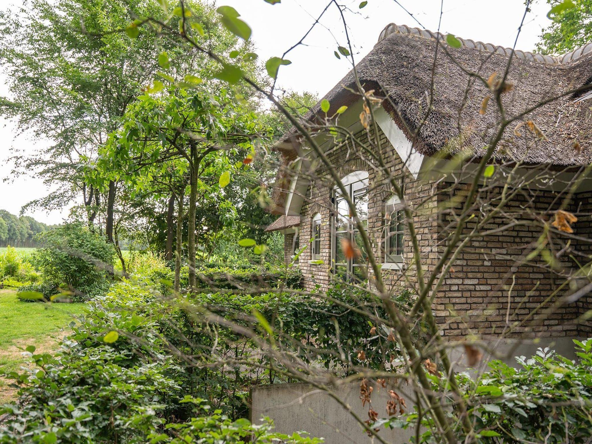 De buitenkant van Vlindervallei Boshuis 16p in Ermelo