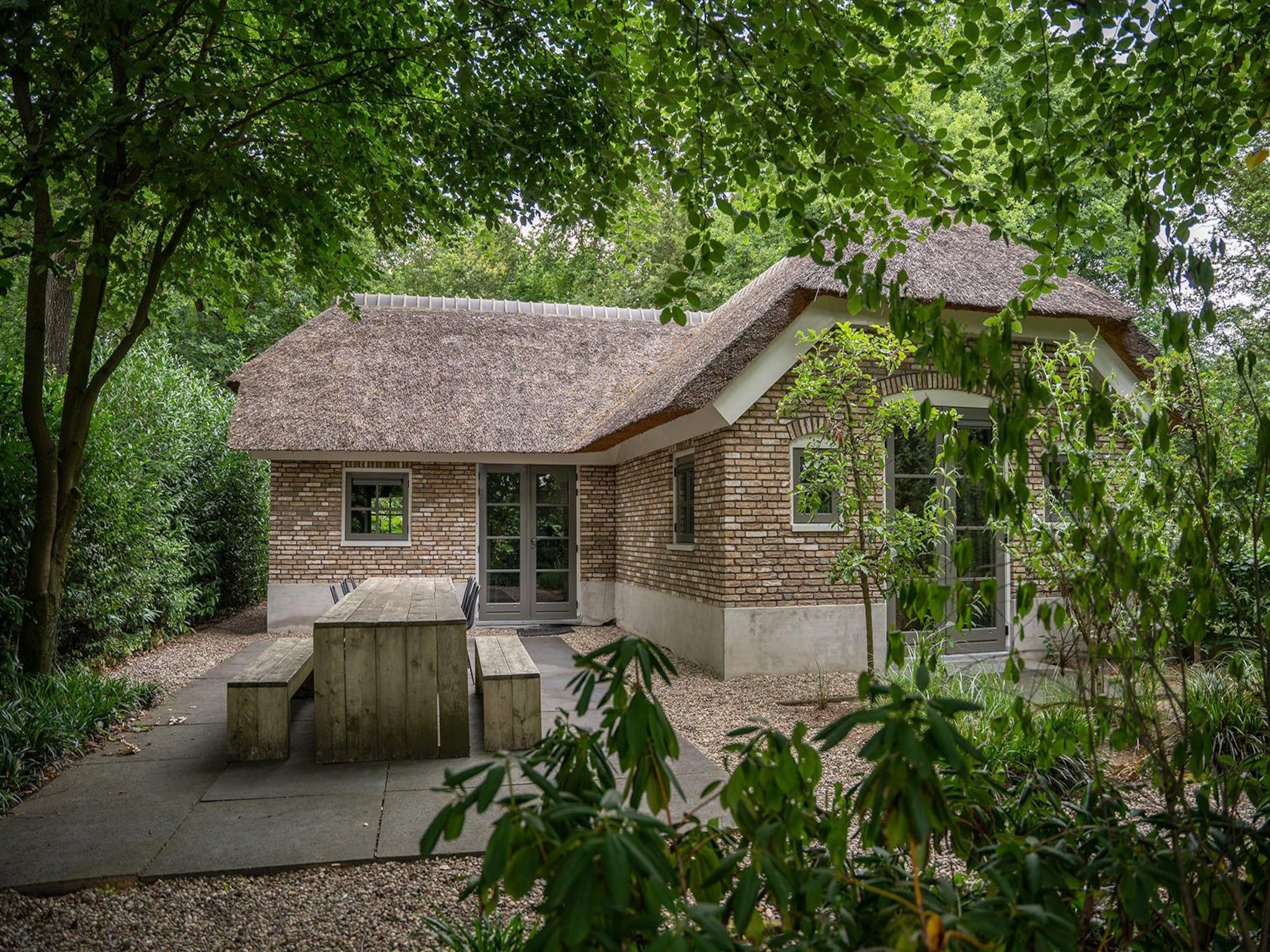 De buitenkant van Vlindervallei Boshuis 16p in Ermelo