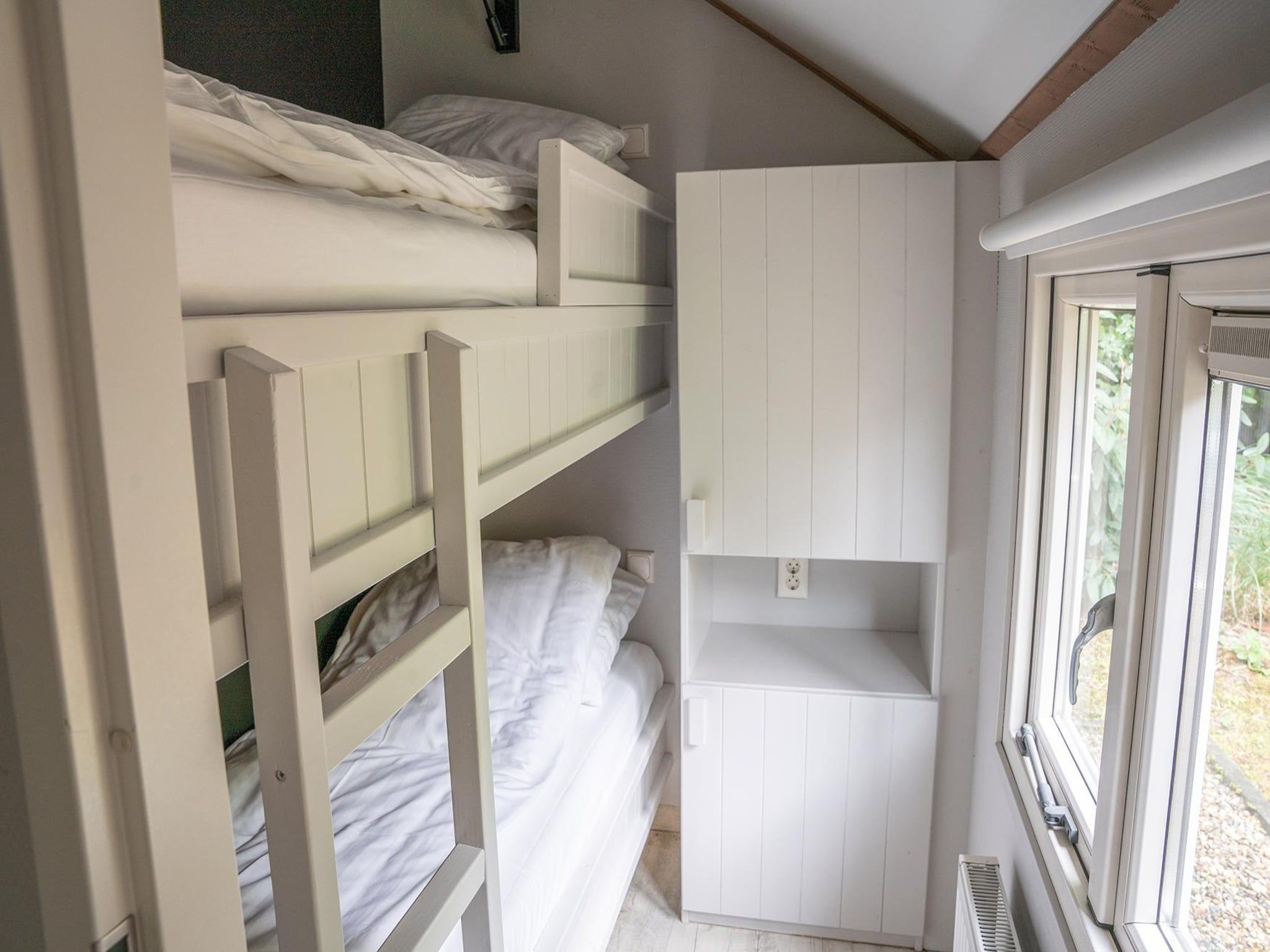 Een slaapkamer van Heivlinder Comfort 4p in Ermelo