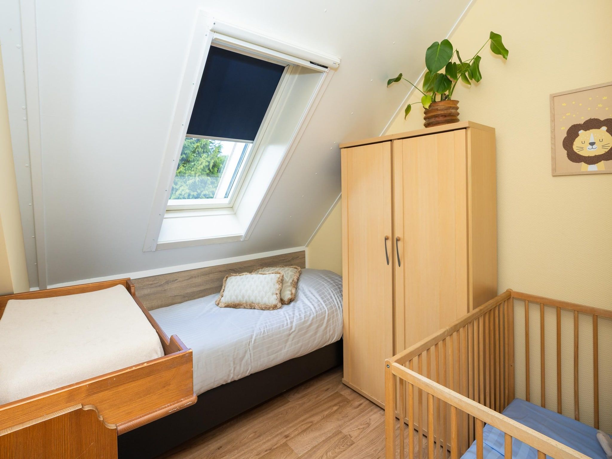 Een slaapkamer van Andijk 15 in Andijk