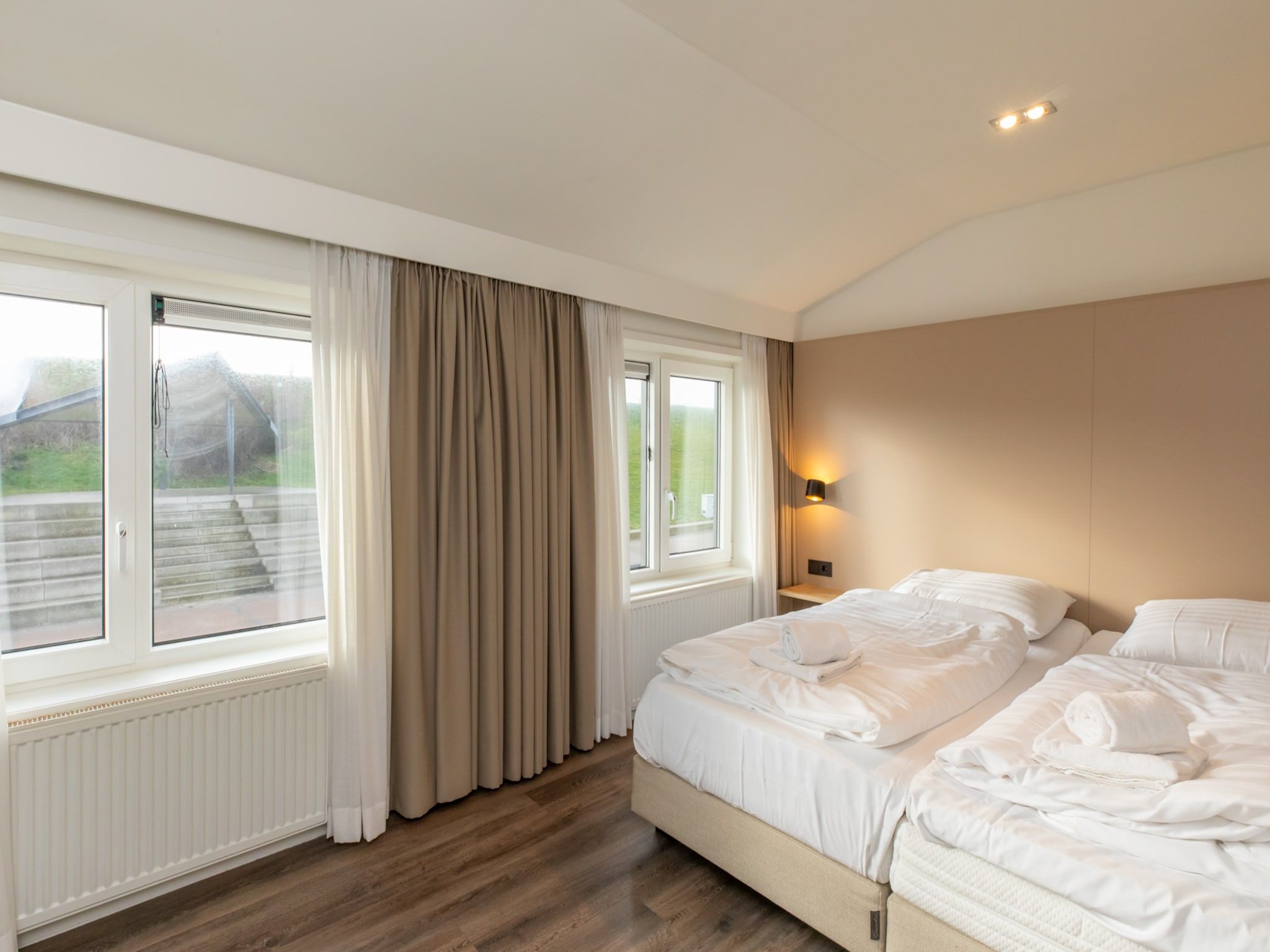 Een slaapkamer van Overnachten in Zoutelande  Comfortabel Appartement Langstraat 5A in Zoutelande