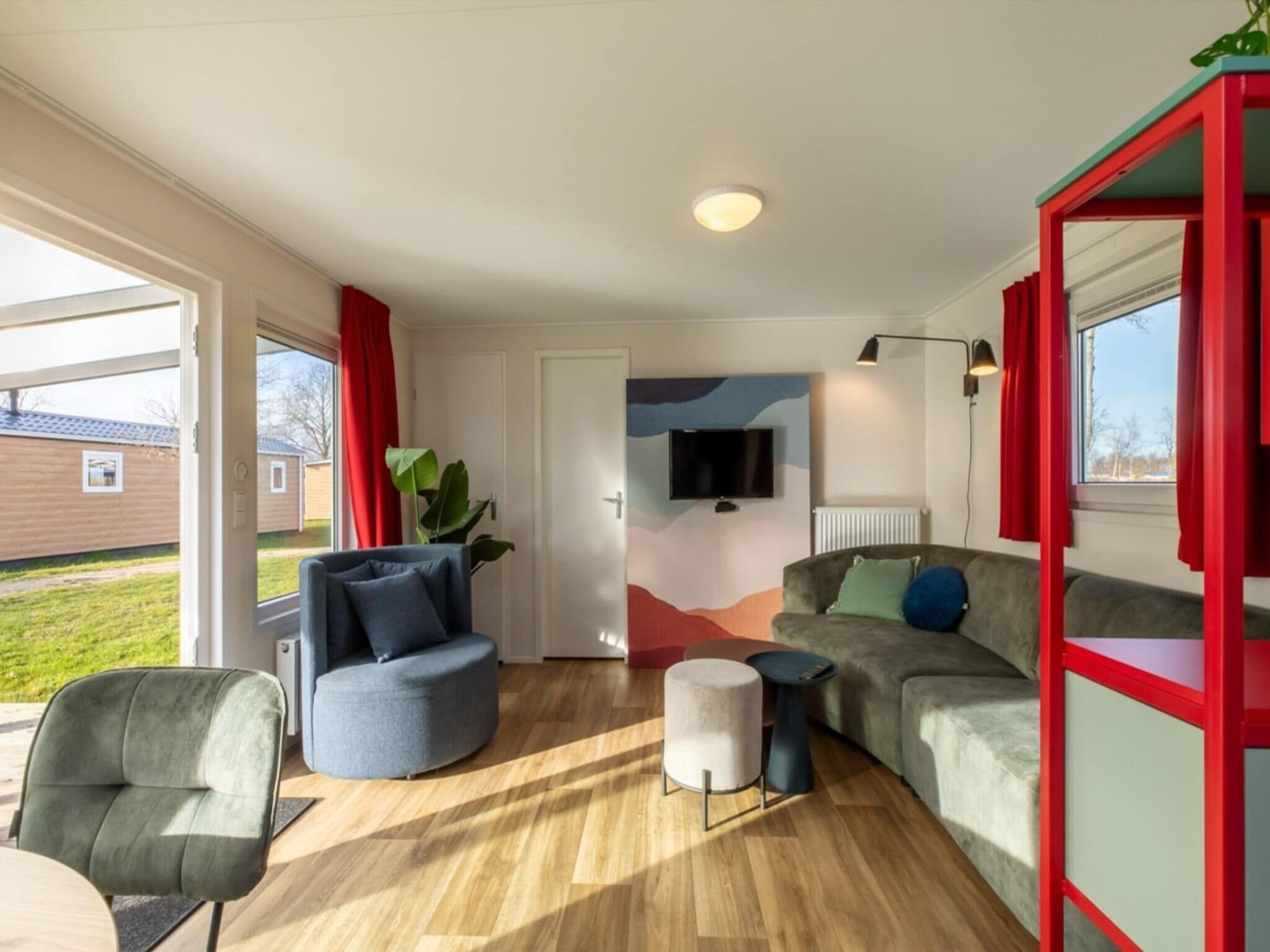 De woonkamer van Chalet - Camping de Duinhoeve 'Bosdier' in Burgh-Haamstede