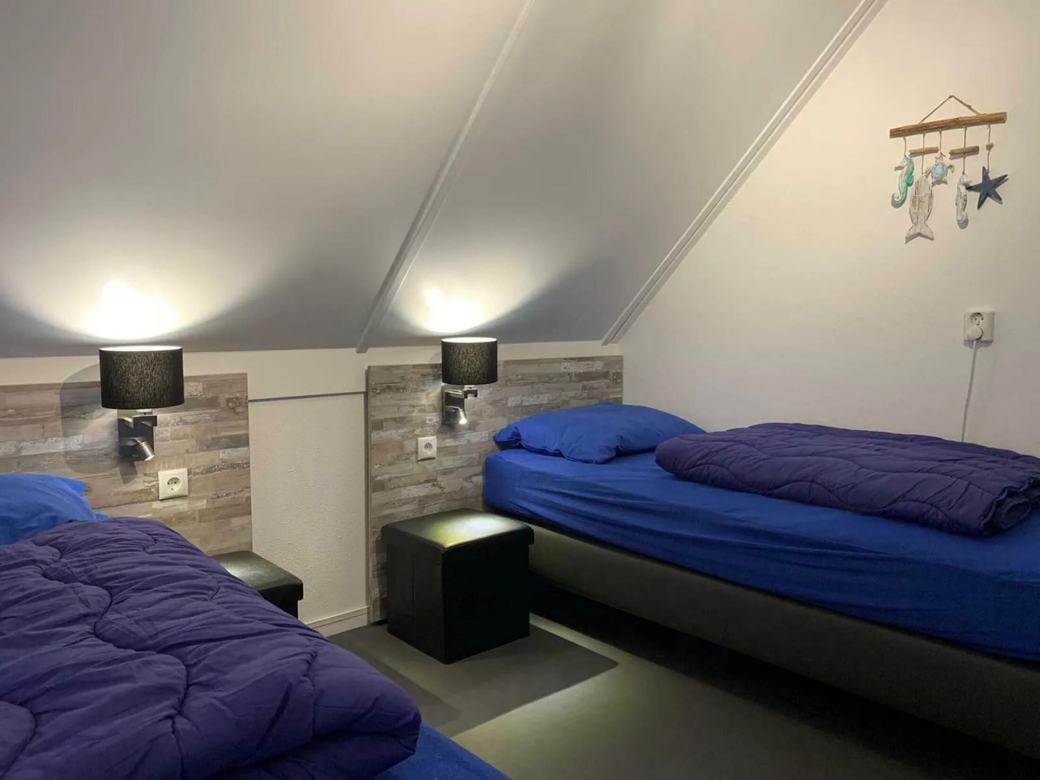Een slaapkamer van Dijkhuis Sauna 6 in Medemblik