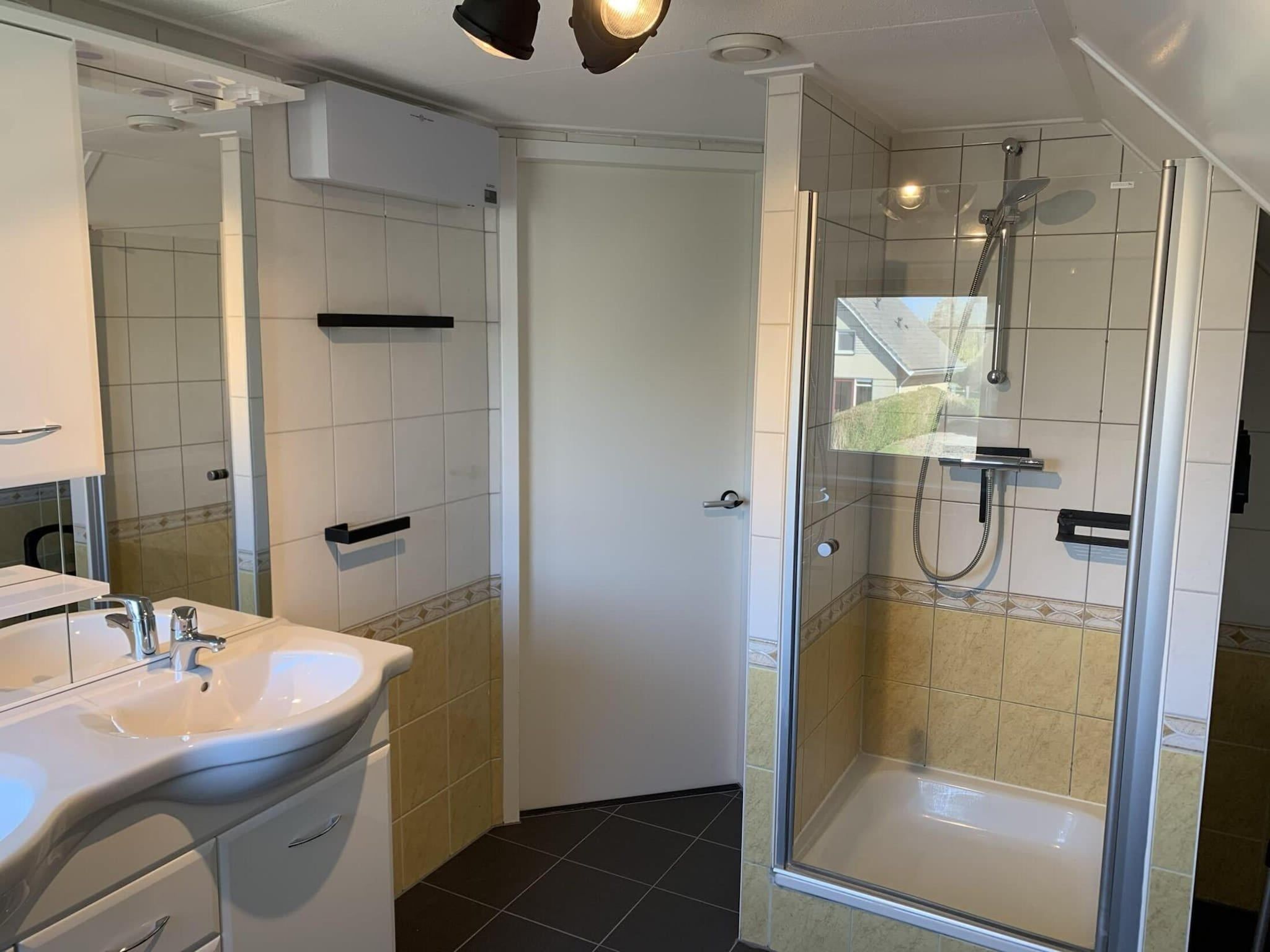 De badkamer van Dijkhuis Sauna 6 in Medemblik