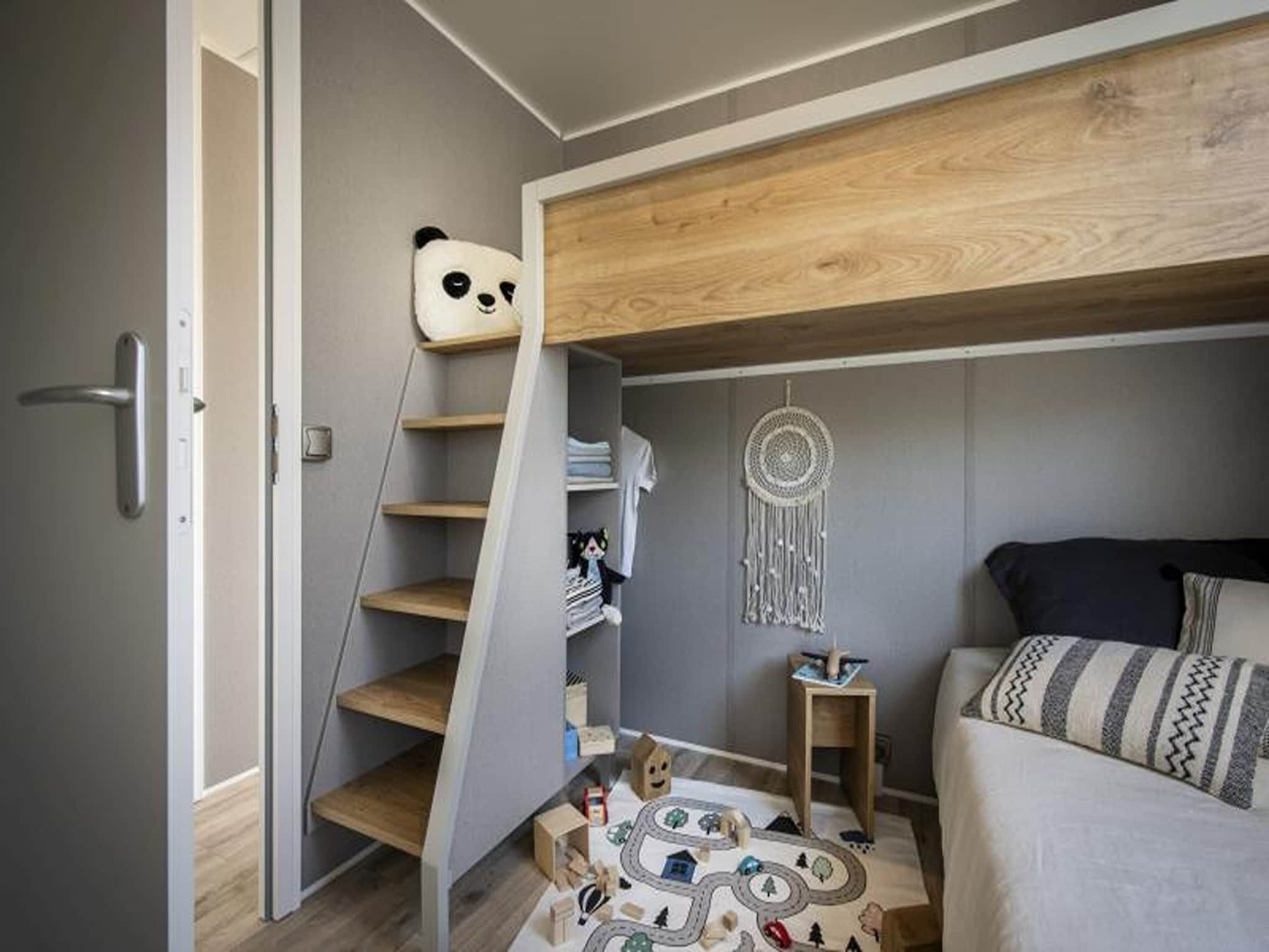 Een slaapkamer van Terraslodge 1 in Heeg