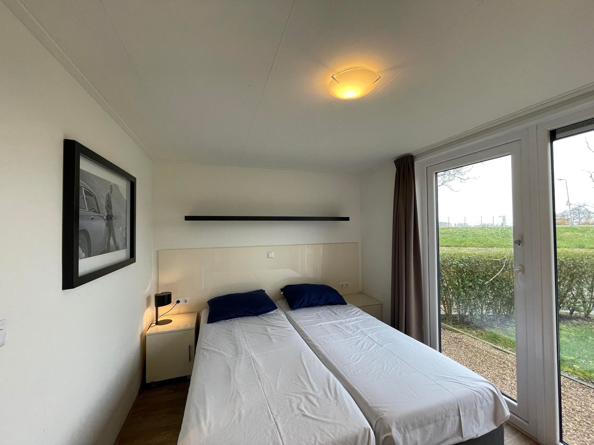 Een slaapkamer van Molenhof Villa  10 personen in West-Graftdijk