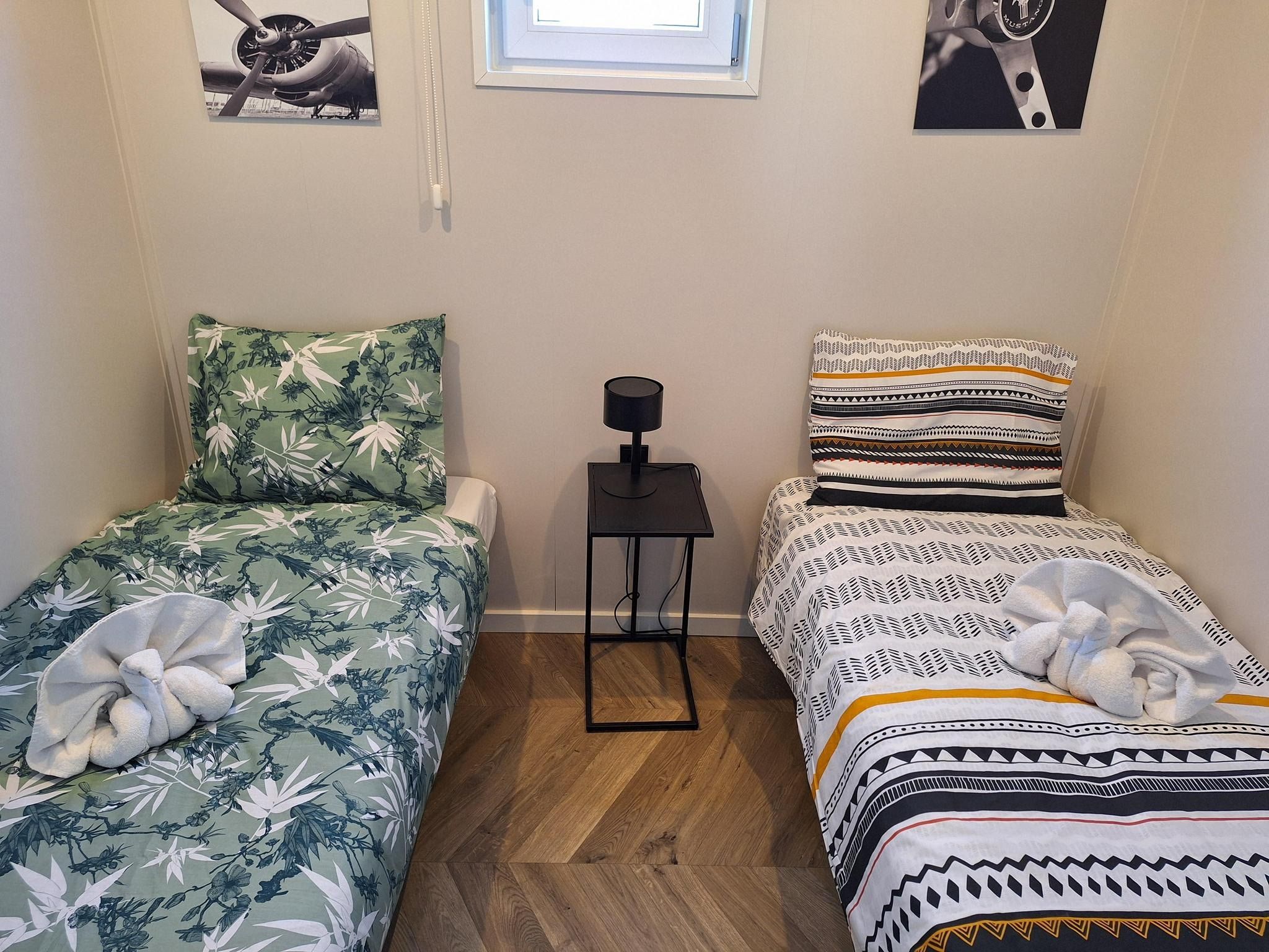 Een slaapkamer van Zaans Huisje  4 personen in West-Graftdijk
