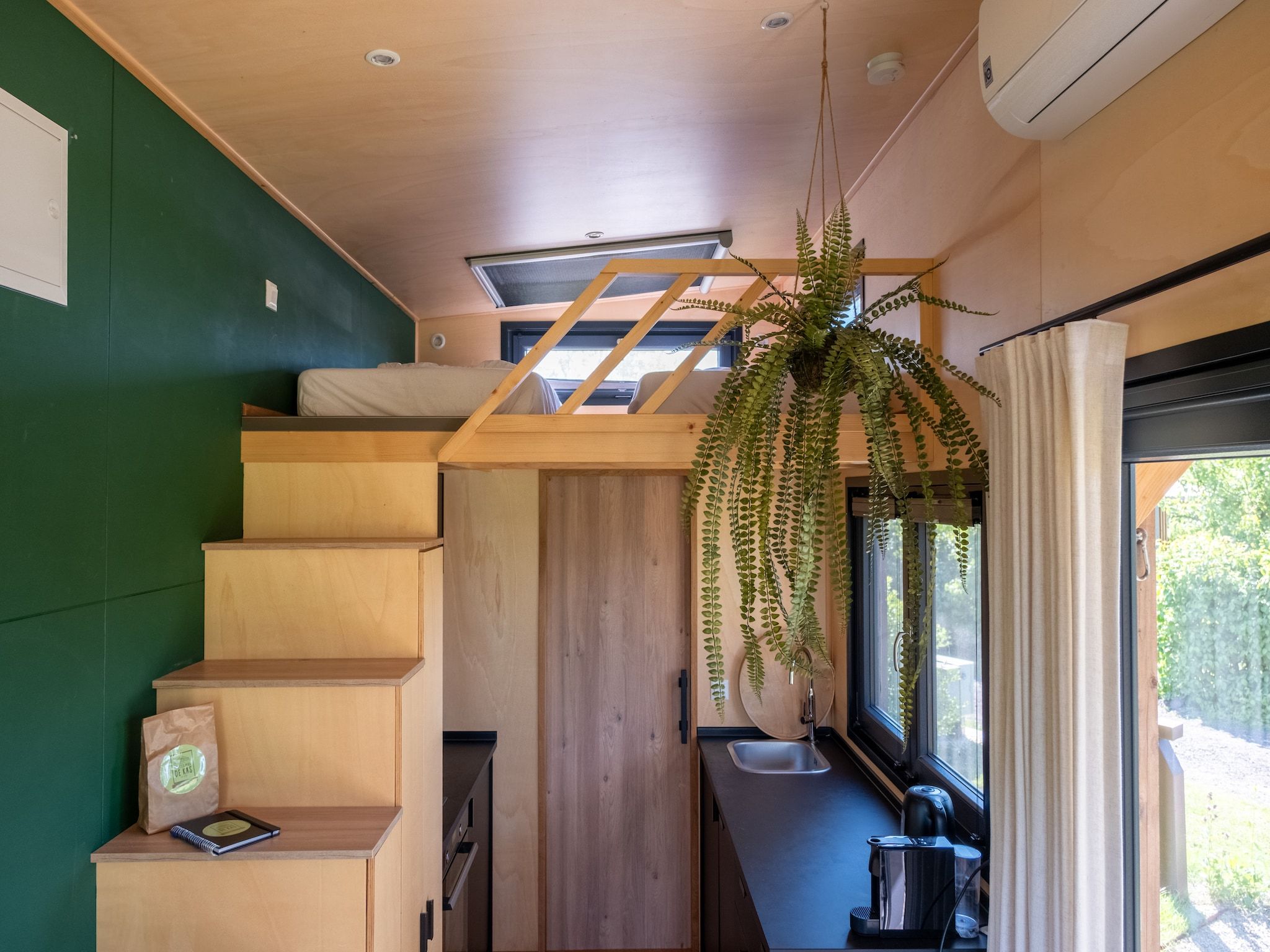 Een slaapkamer van Tiny house voor 2  2 personen in Scherpenzeel (FR)