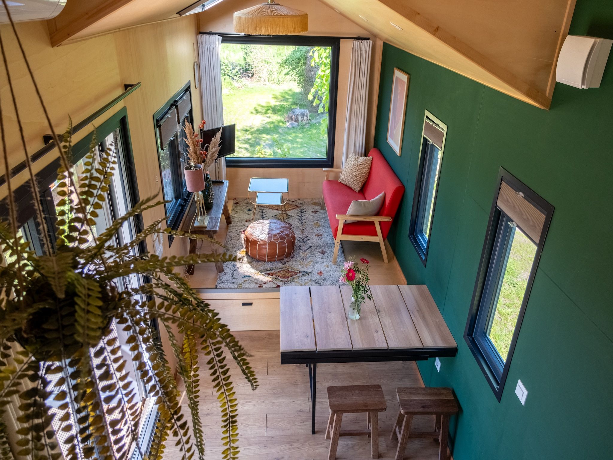 De woonkamer van Groepsruimte i.c.m. 4 tiny greenhouses in Scherpenzeel (FR)