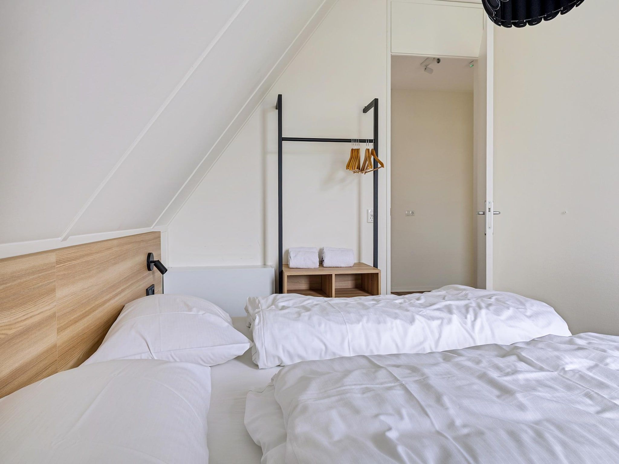 Een slaapkamer van Koggehuys in PS Opperdoes