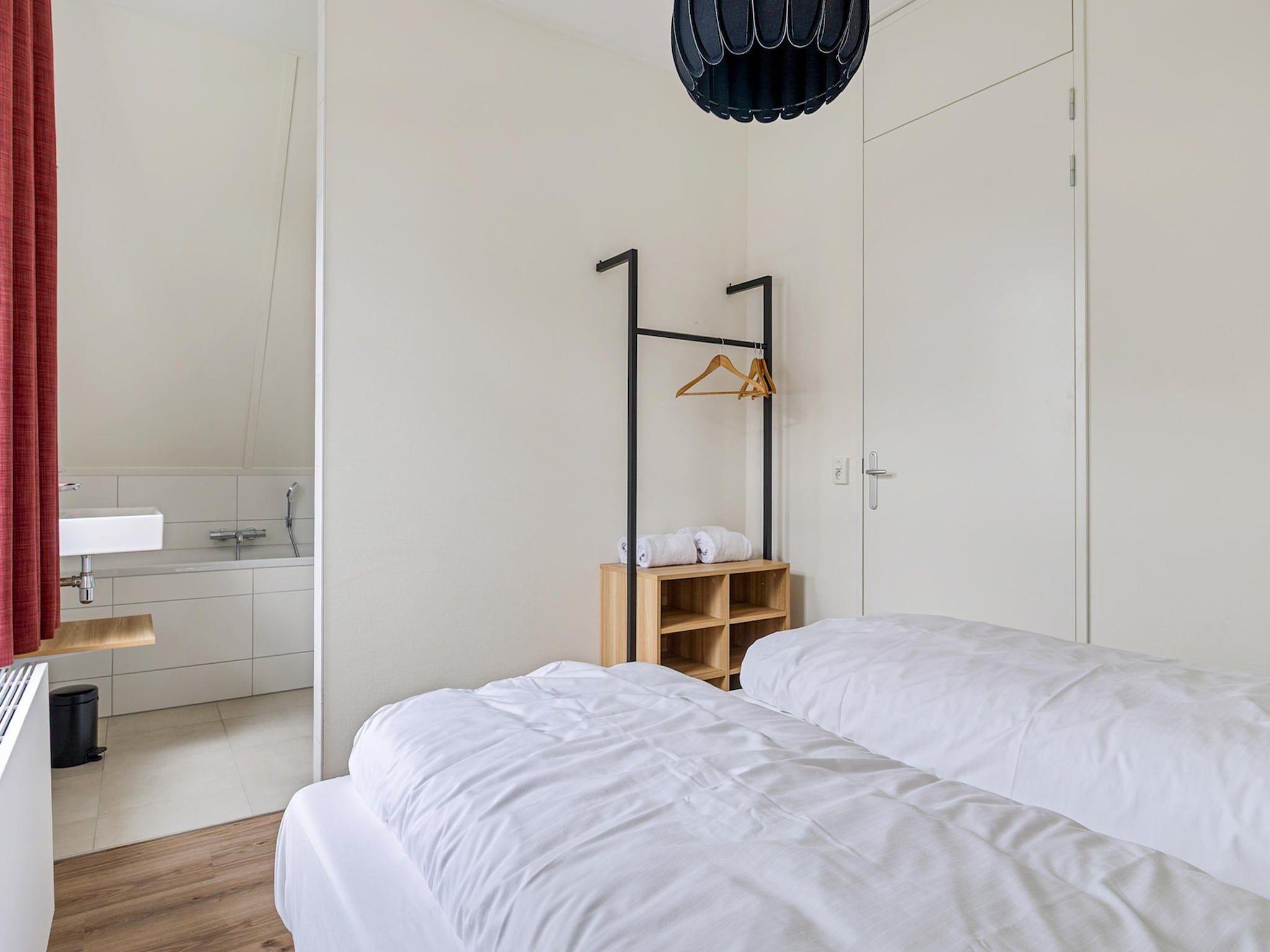 Een slaapkamer van Koggehuys in PS Opperdoes