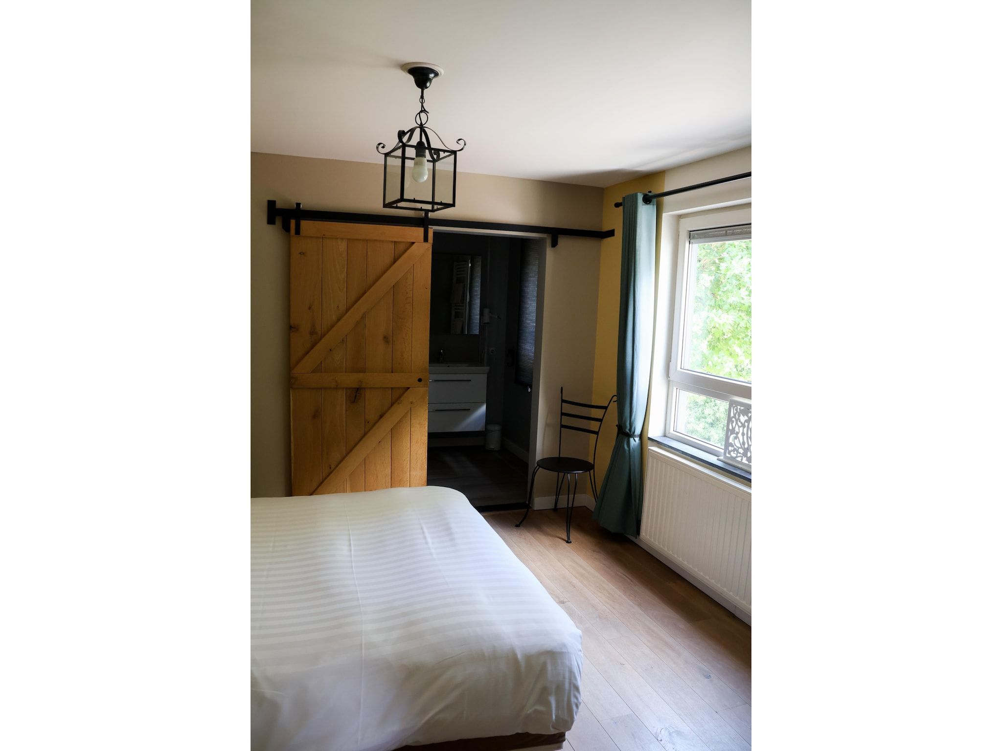 Een slaapkamer van Luxe appartement Nous in Valkenburg