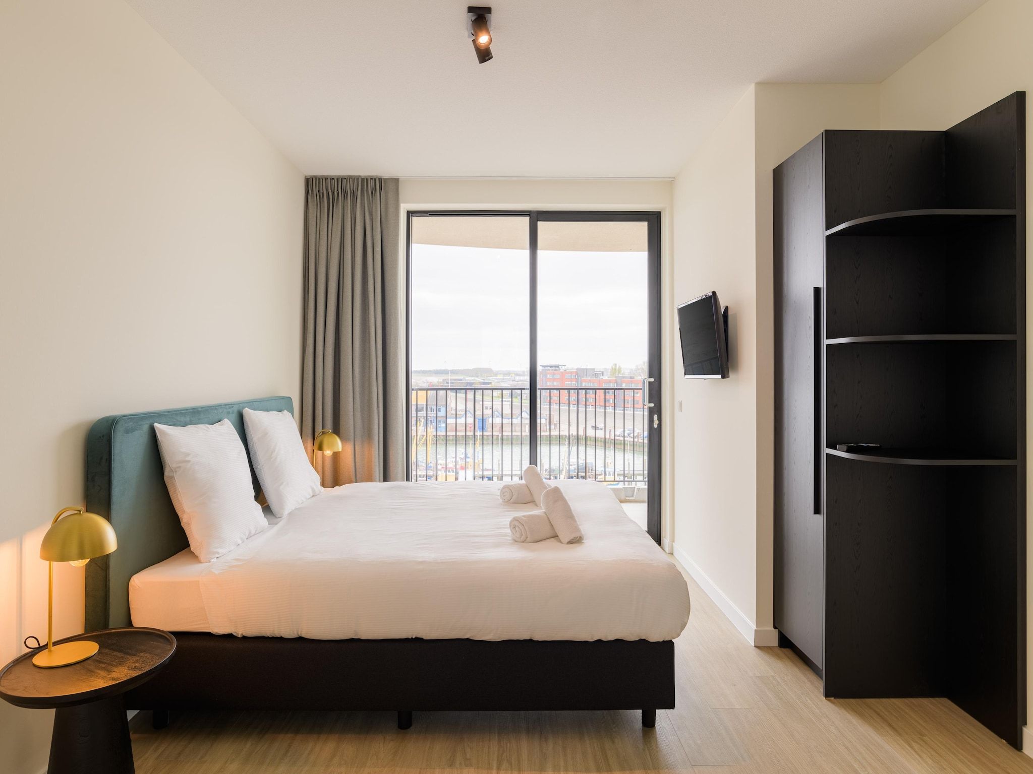 Een slaapkamer van Breskens Apartments & Penthouses 17 in Breskens
