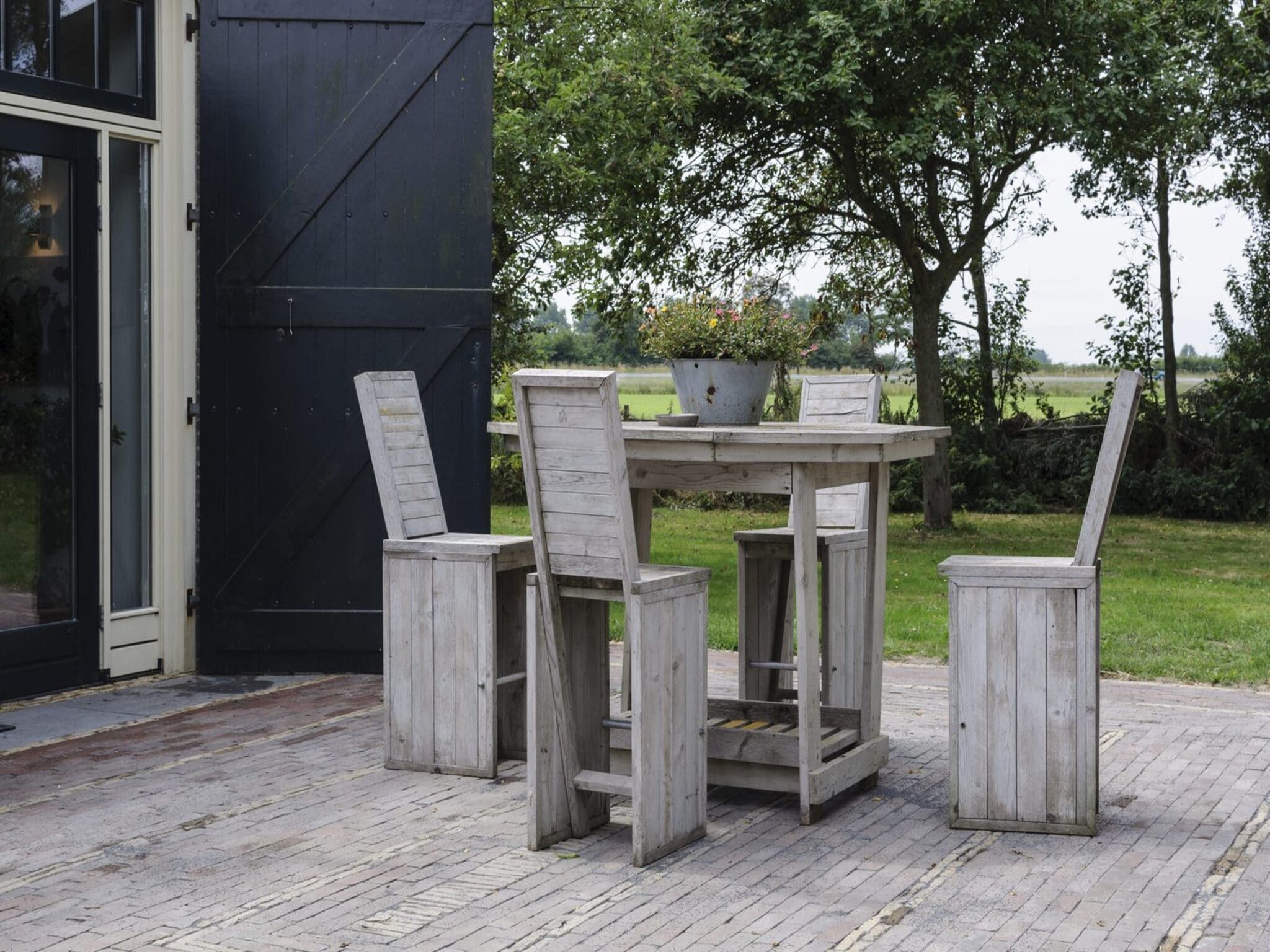 Het terras van Groepsaccomodatie - Balkenhoeve in Schagen