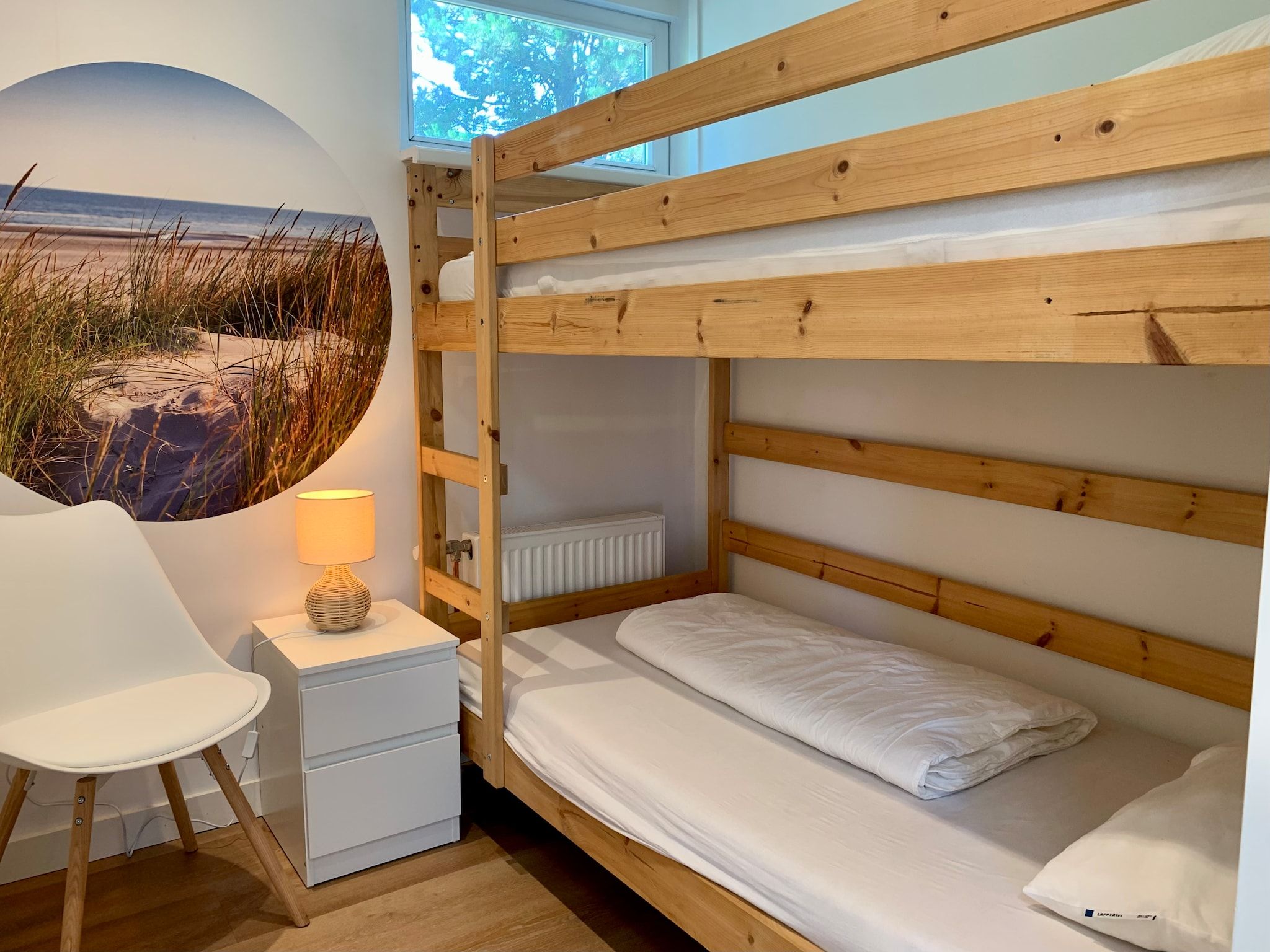 Een slaapkamer van Wildrijk 075 in Sint Maartenszee