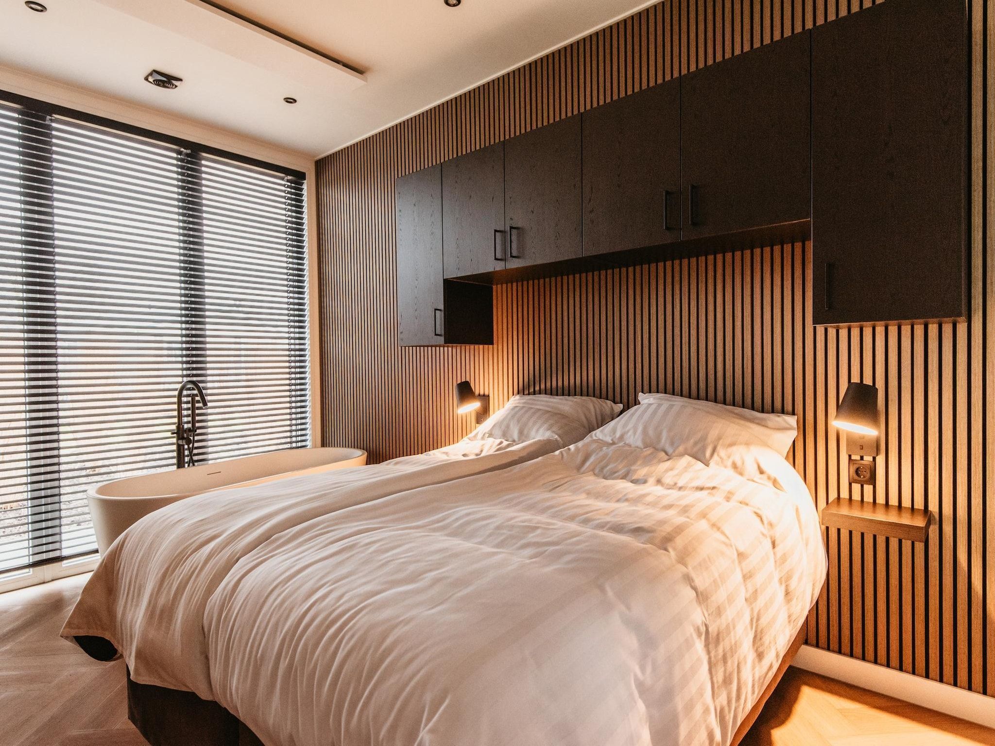Een slaapkamer van Chalet aan het Water - Betuwse Hofjes - 4 pax December in Kesteren