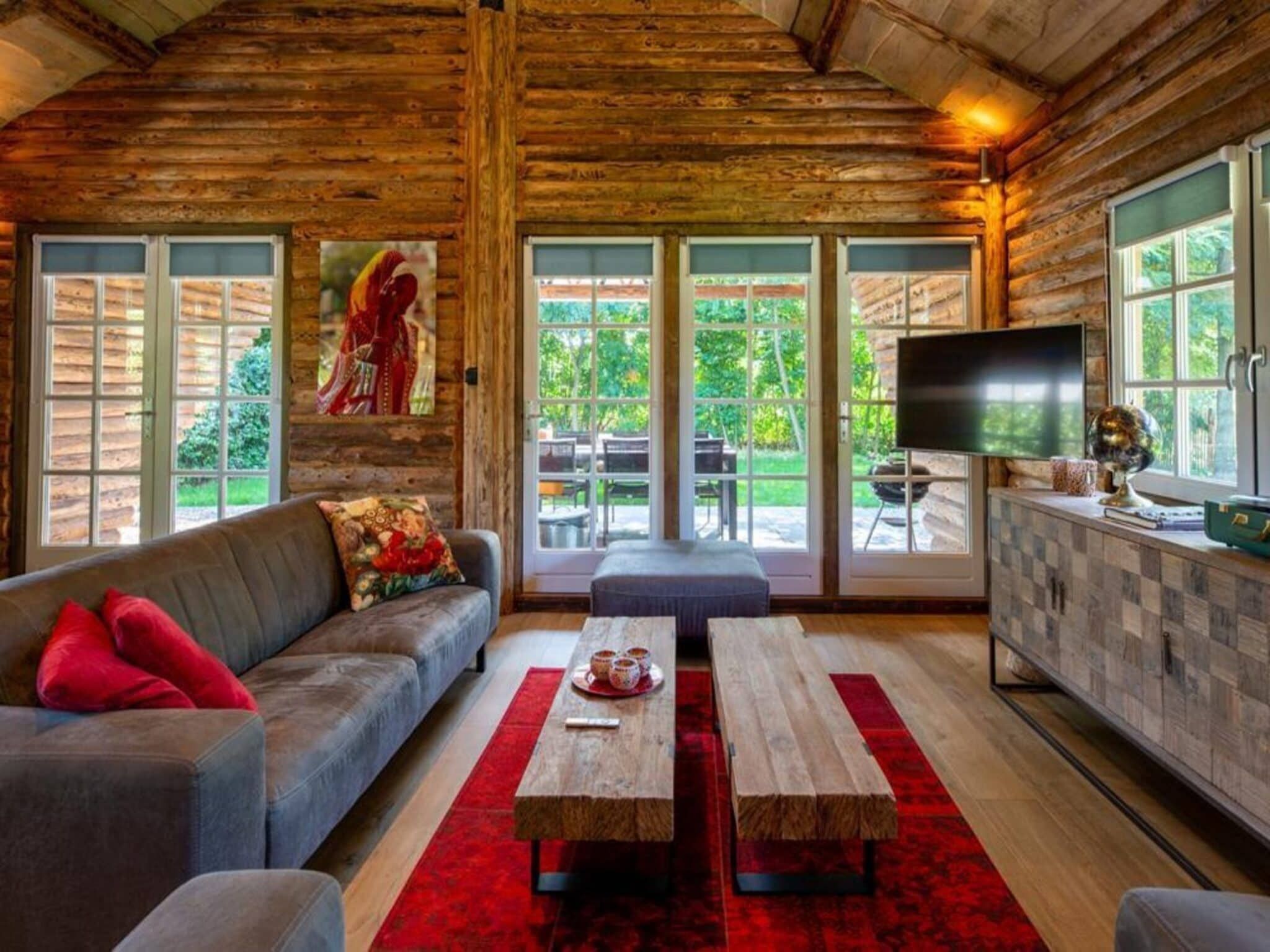 De woonkamer van Paalchalet 723 in Baarle-nassau