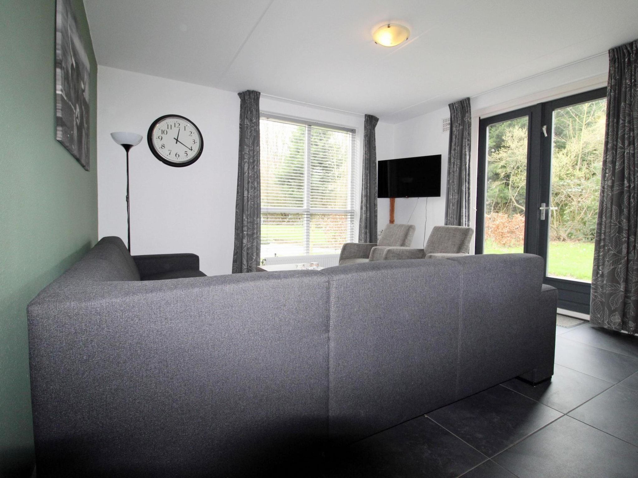 De woonkamer van 6 - Person Forest 28 Bungalow in Ewijk