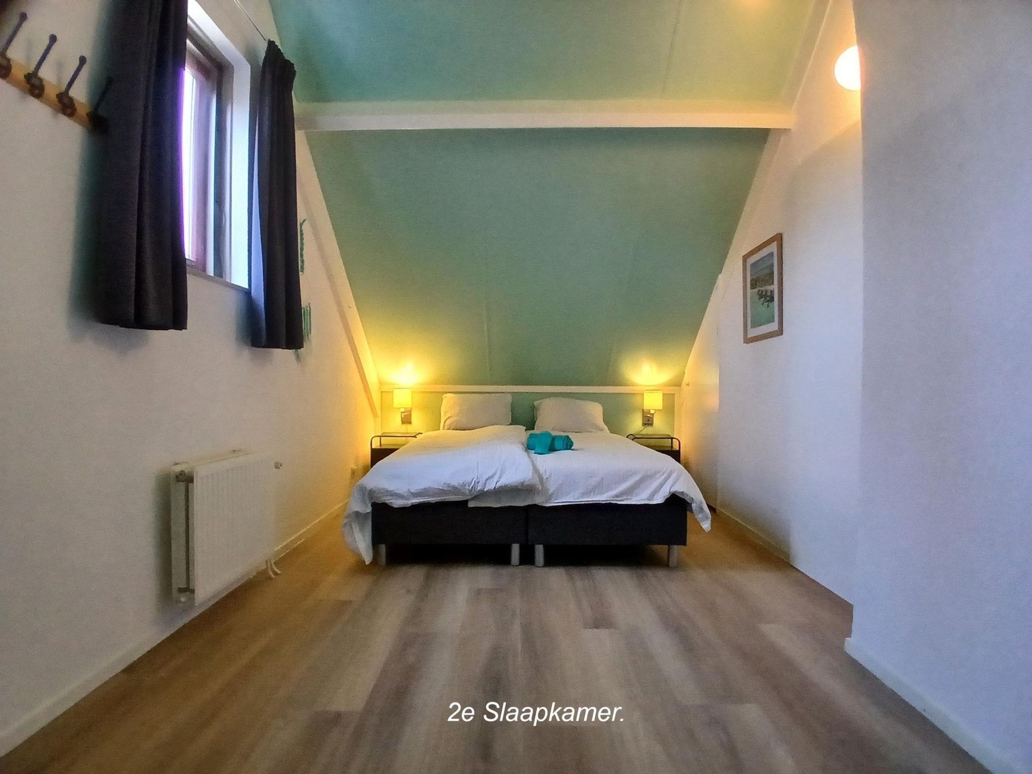 Een slaapkamer van 6 - Persons La Luna in Ewijk