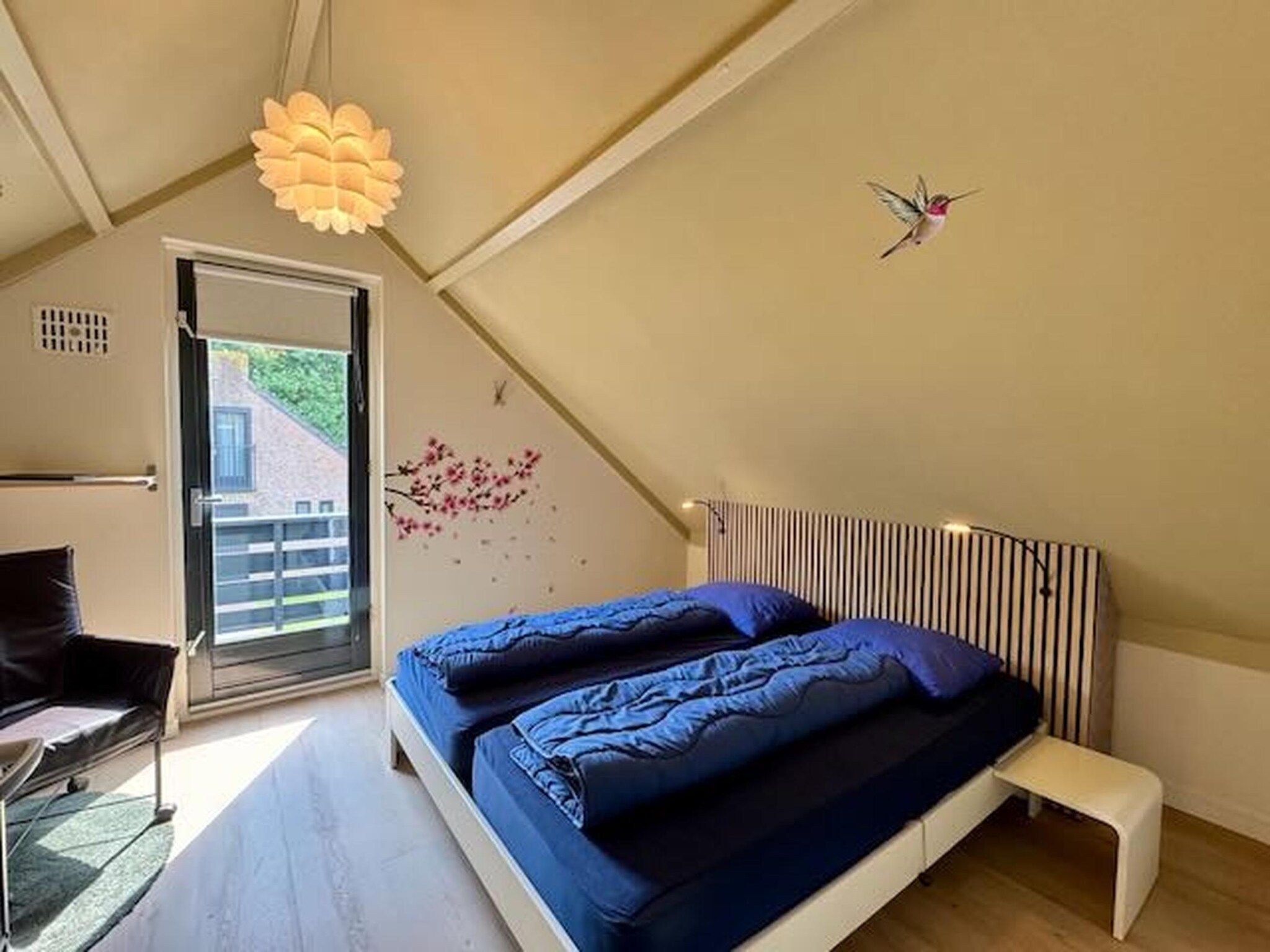 Een slaapkamer van 6 - Persons Forest VIP Bungalow (copy) in Ewijk