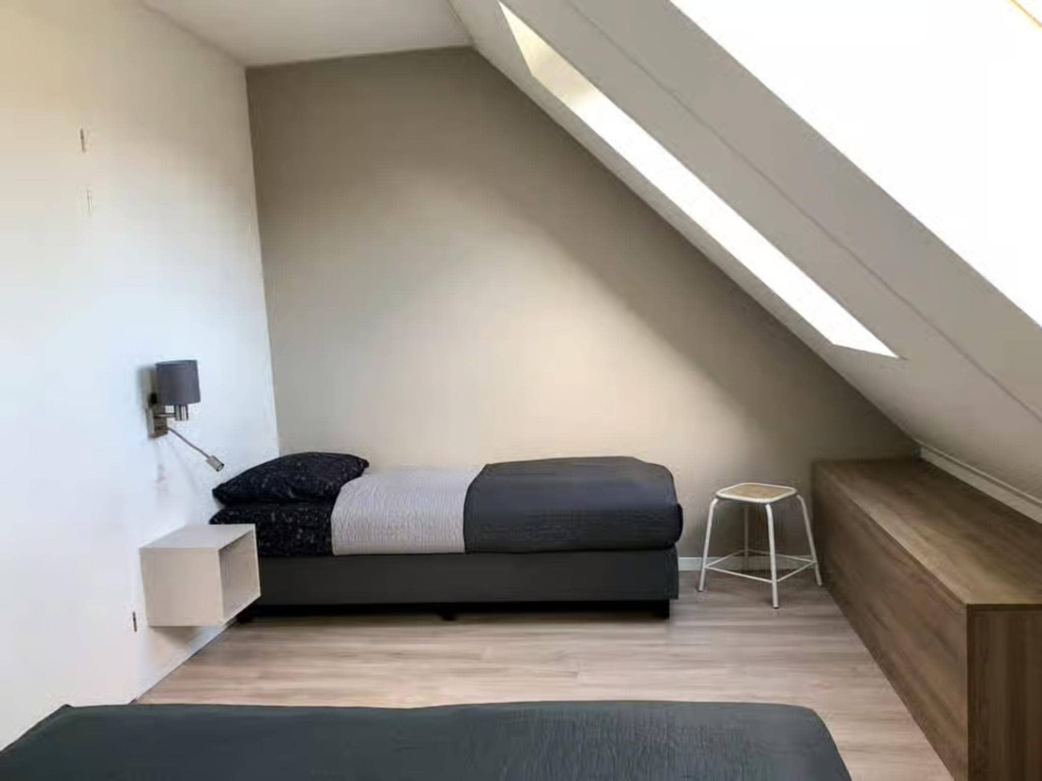 Een slaapkamer van Plein 40 Lodge 7 in Zoutelande