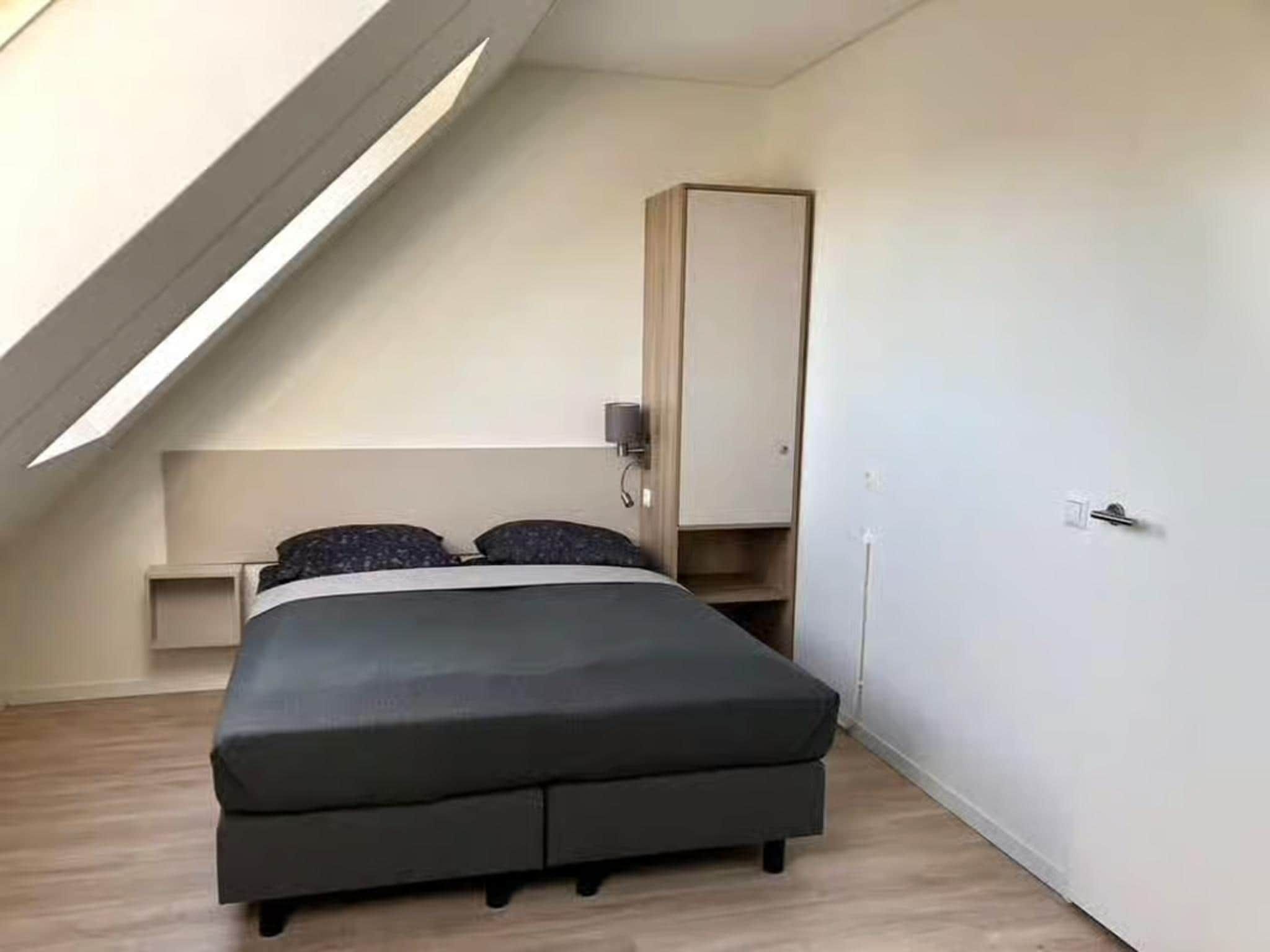 Een slaapkamer van Plein 40 Lodge 7 in Zoutelande