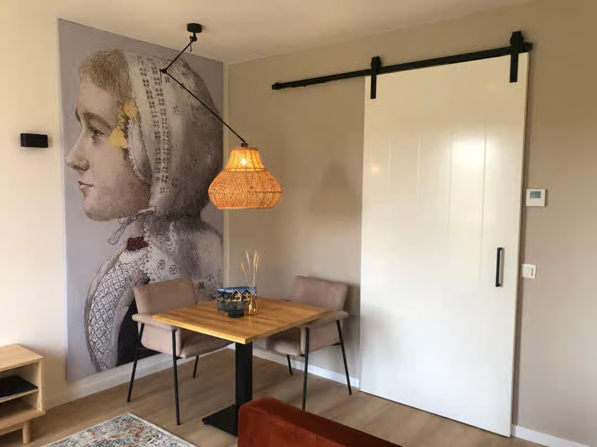 De eetkamer van Plein 40 Lodge 11 - New in Zoutelande
