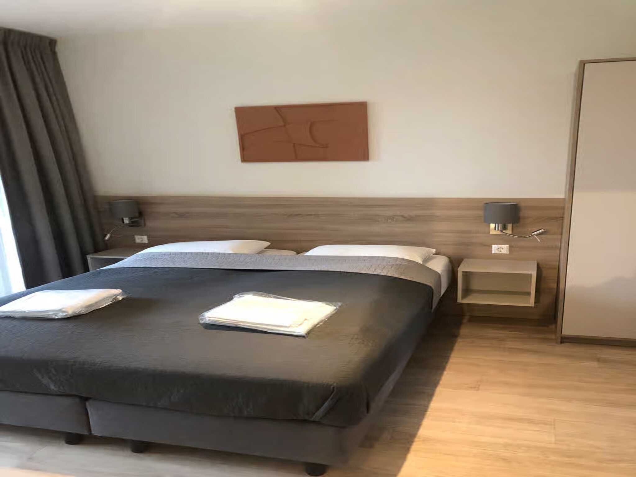 Een slaapkamer van Plein 40 Lodge 15 in Zoutelande
