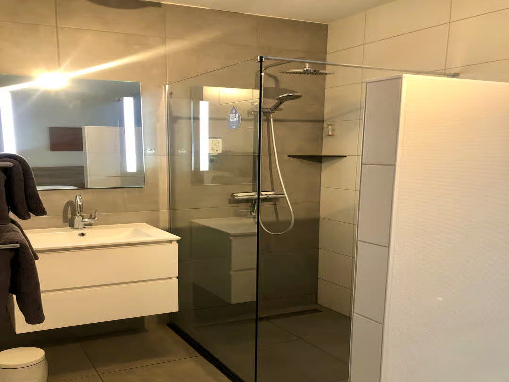 De badkamer van Plein 40 Lodge 15 in Zoutelande