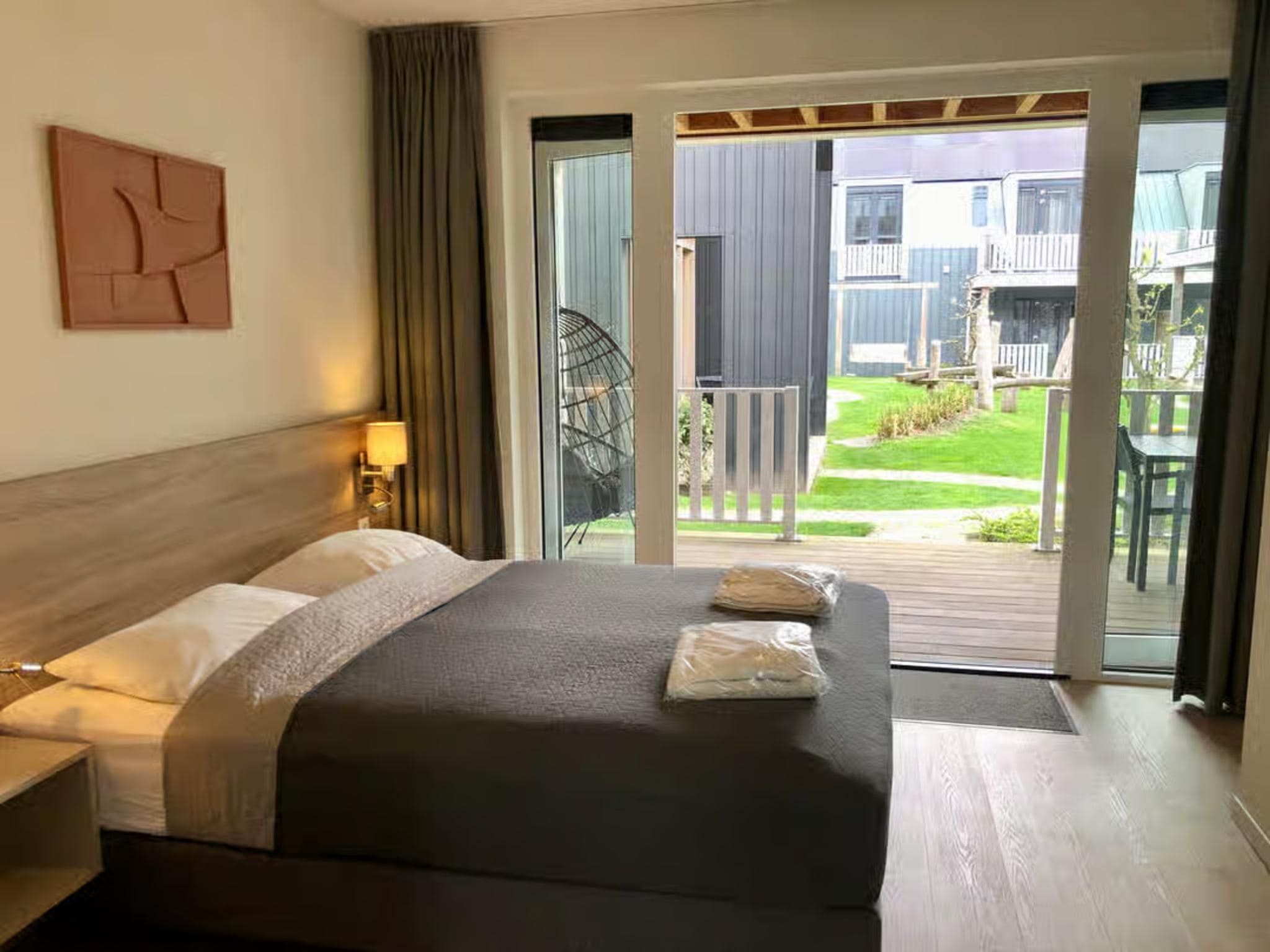 Een slaapkamer van Plein 40 Lodge 16 in Zoutelande