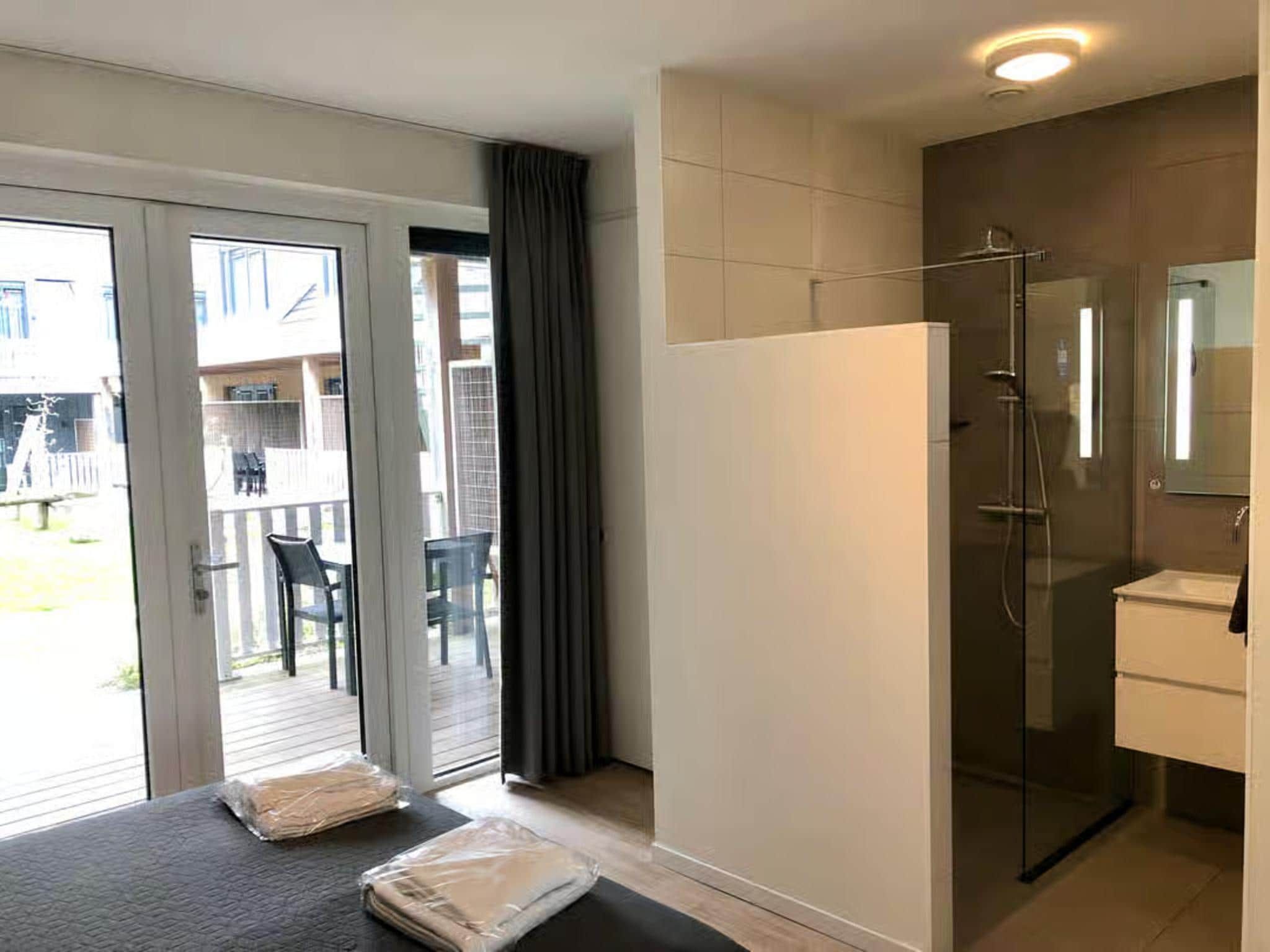 Een slaapkamer van Plein 40 Lodge 16 in Zoutelande